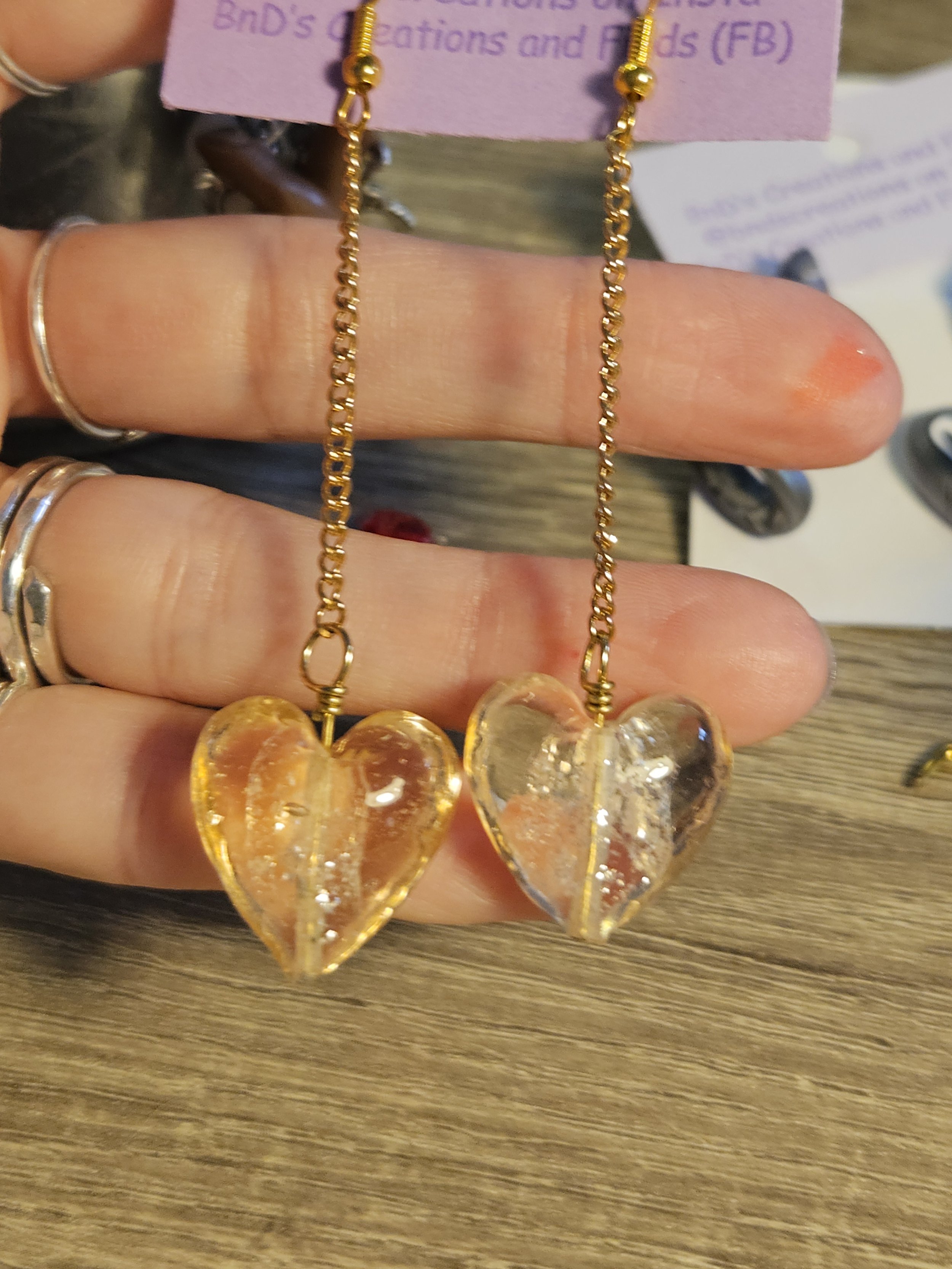 Golden pink dangly heart earrings