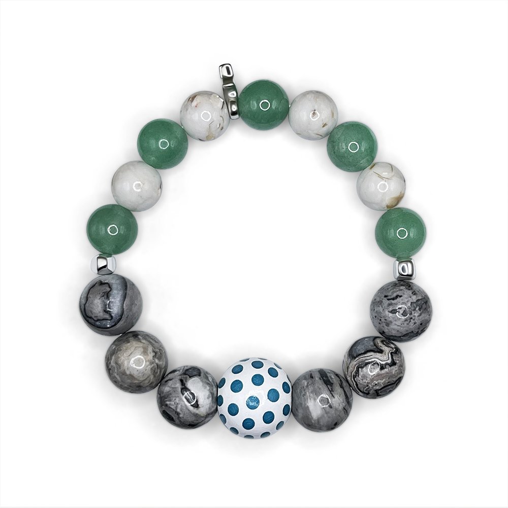 Handmade bracelet with green, grey, and marbled beads featuring a turquoise polka dot centre bead, UK made