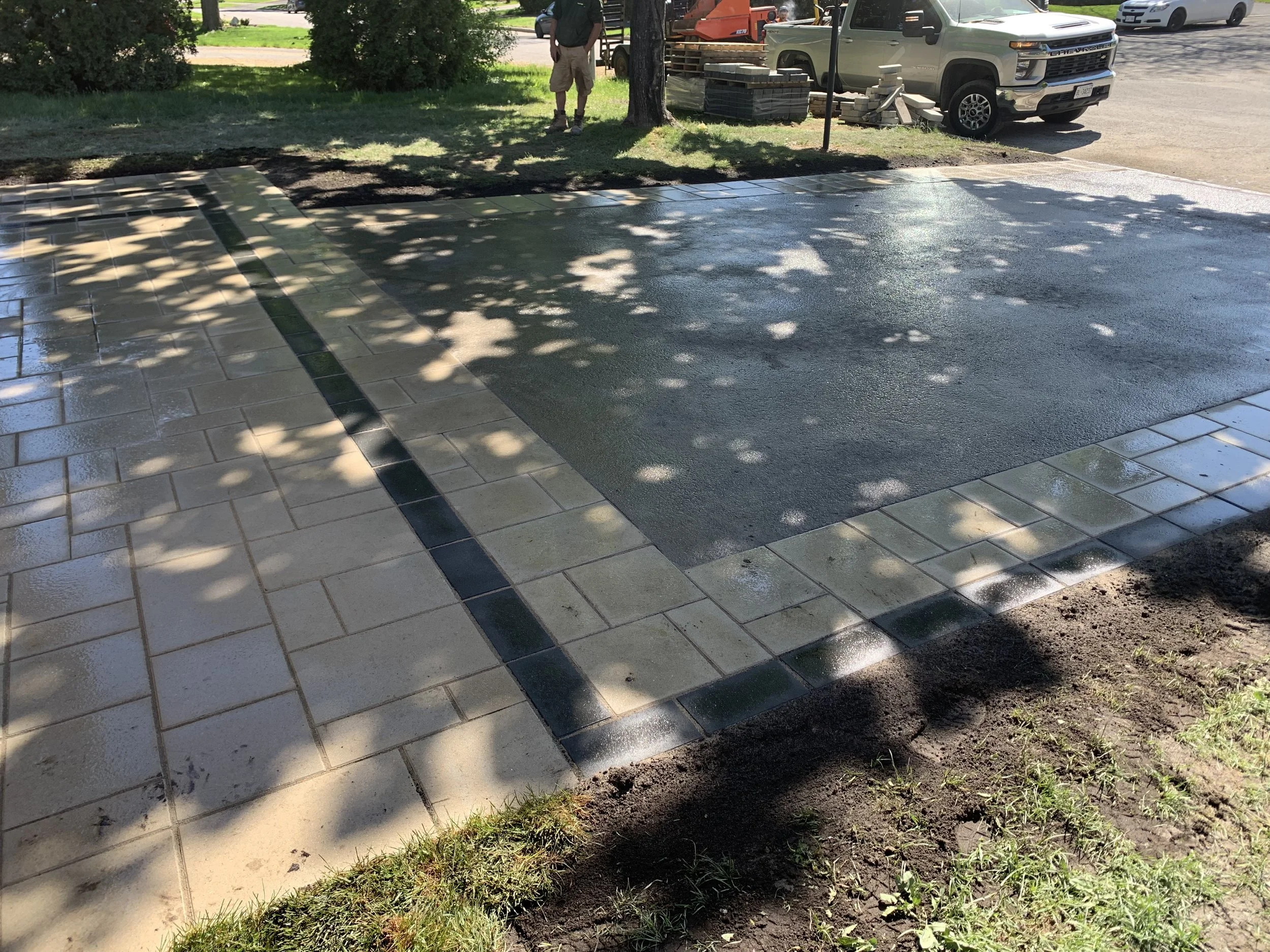 Oranssi technician working on a roof project