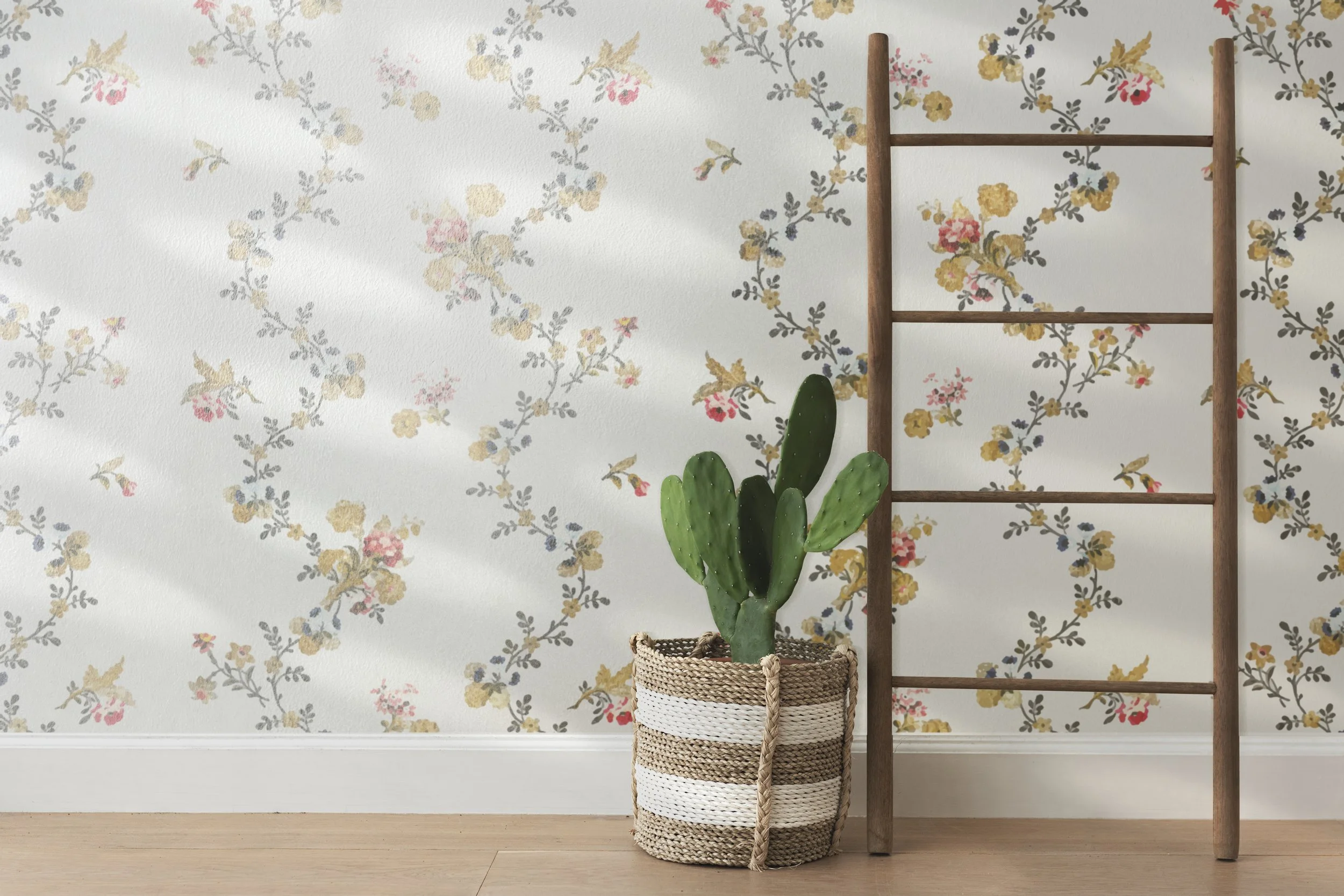 rattan-basket-by-floral-wall-background.jpg