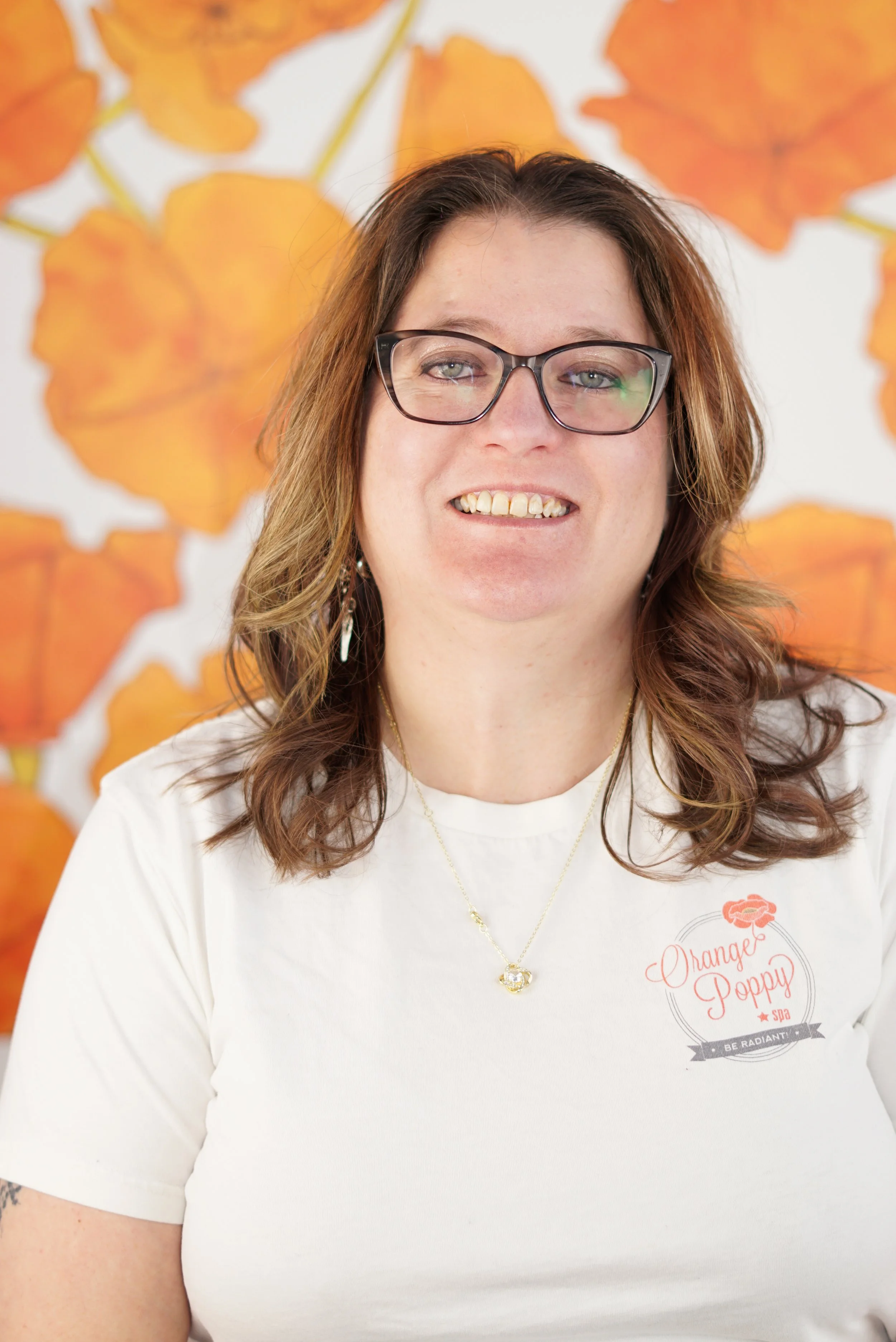 Licensed Esthetician and Nail Tech Bobbie at Orange Poppy Spa