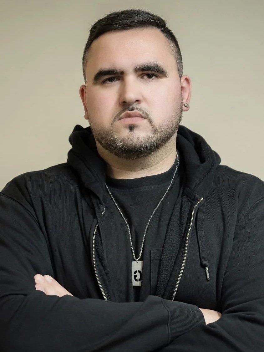 Gulfarm Ahmed - Serious - Arms Crossed