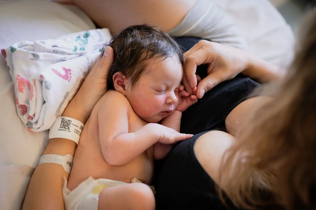 An image of a mother holding her newborn after conceiving with at-home IUI in Hayward, CA 94541 94542 94544 94545