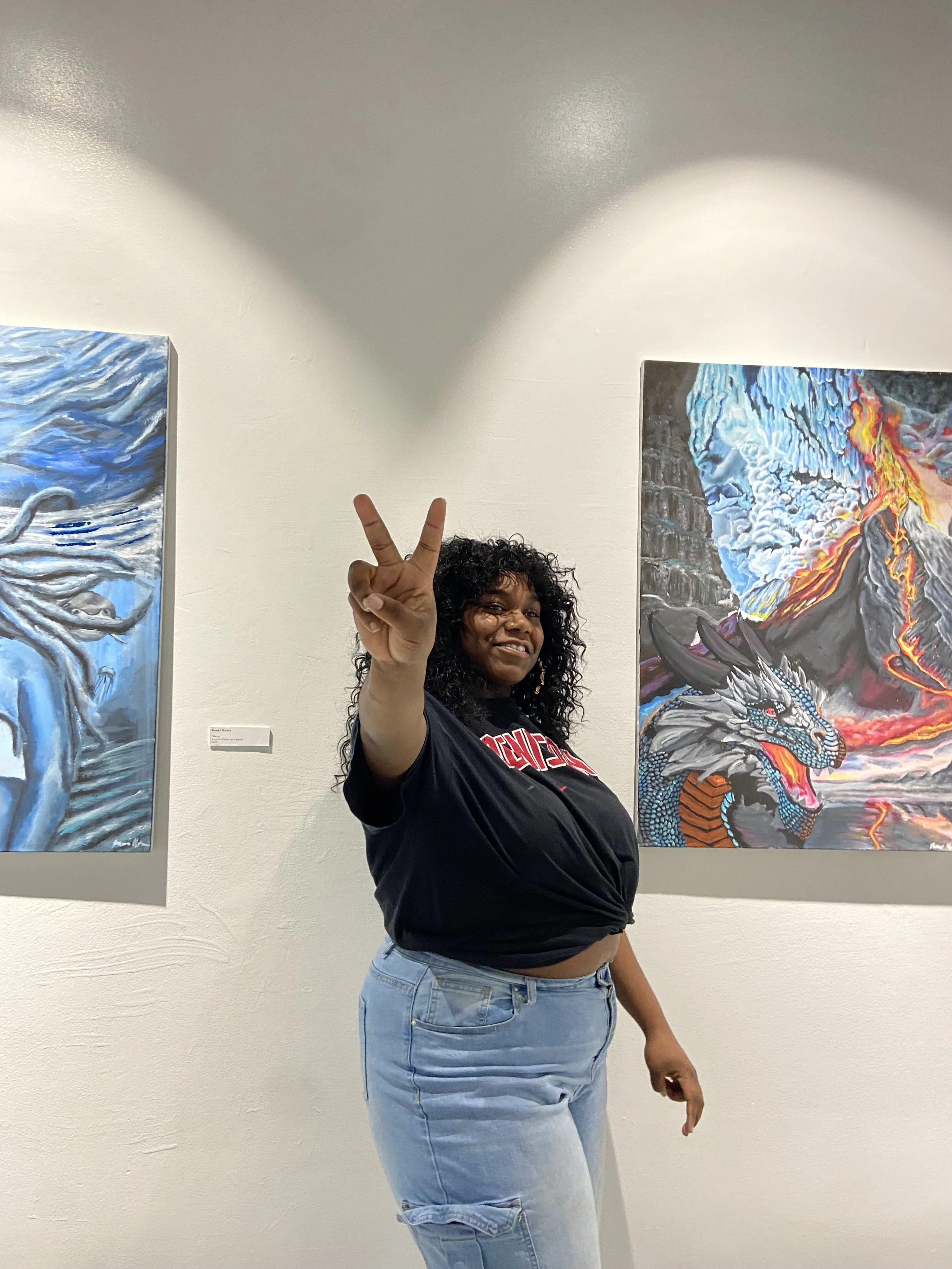 Renai Heath with her works "Water" (2024) and "Fire" (2024)