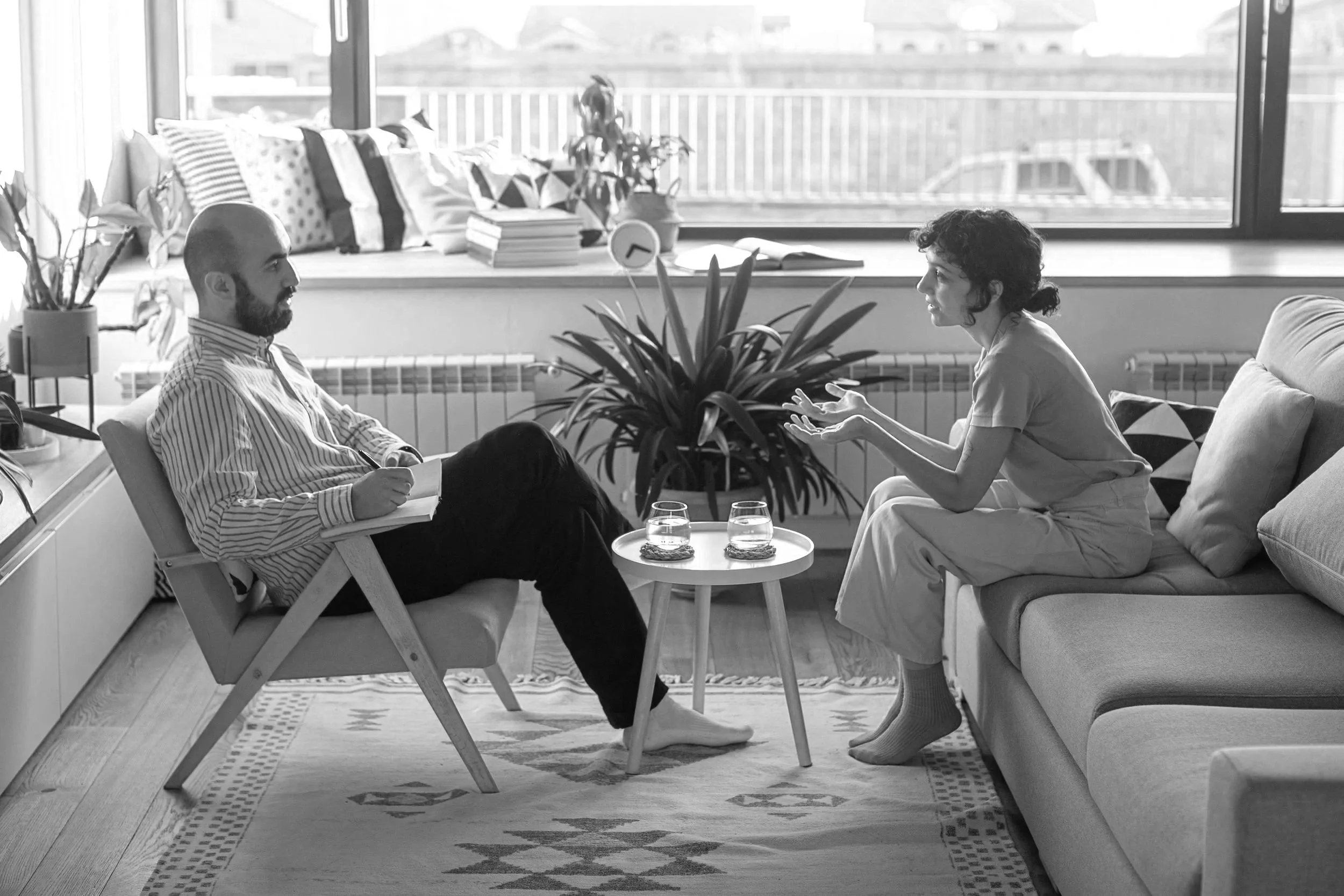 Therapist and client in calm conversation during a counselling session, symbolizing emotional safety, empathy, and sensitivity in therapy.