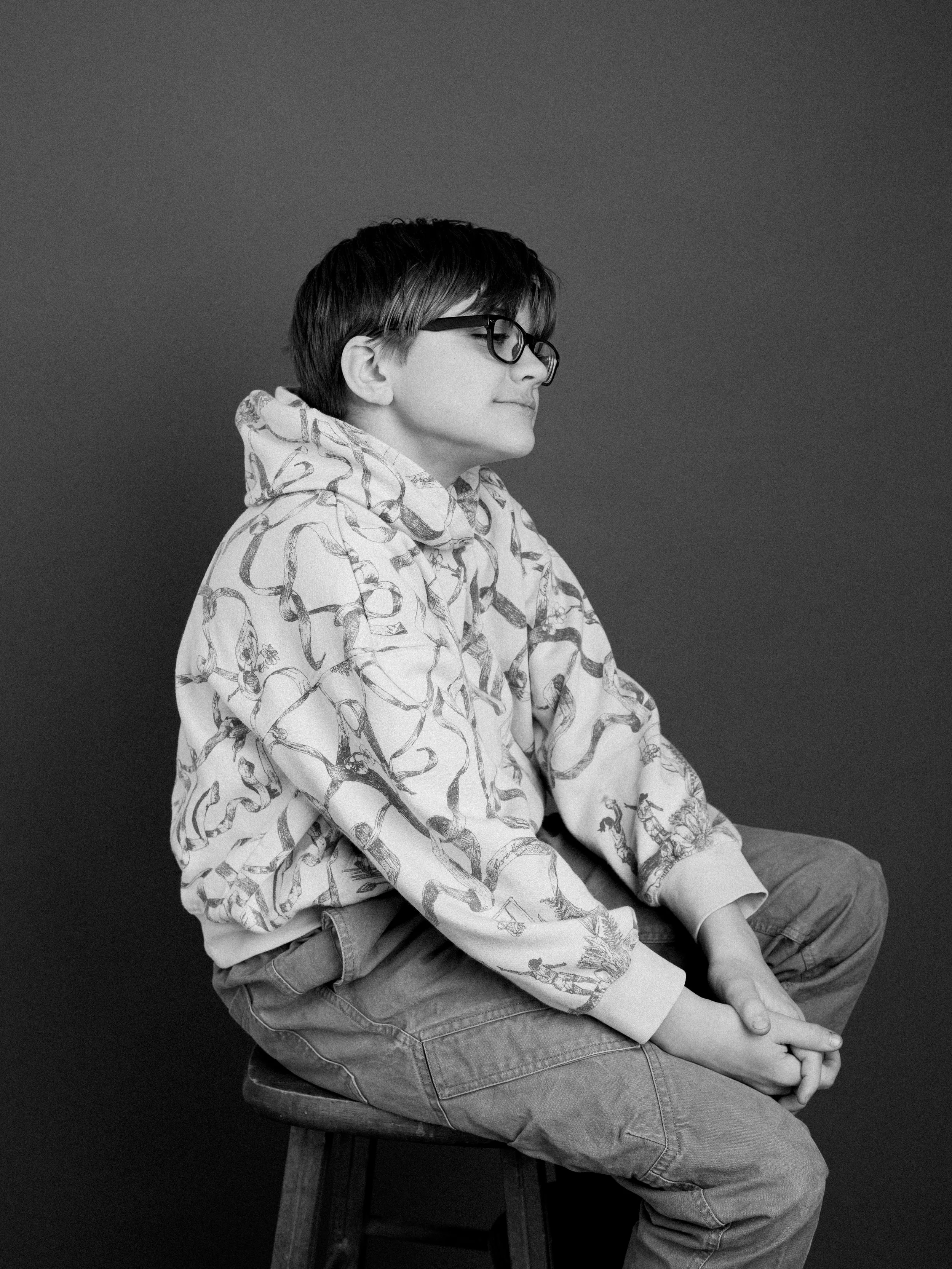 Relaxed studio portrait of a teen boy at Nikki Gardner Studio