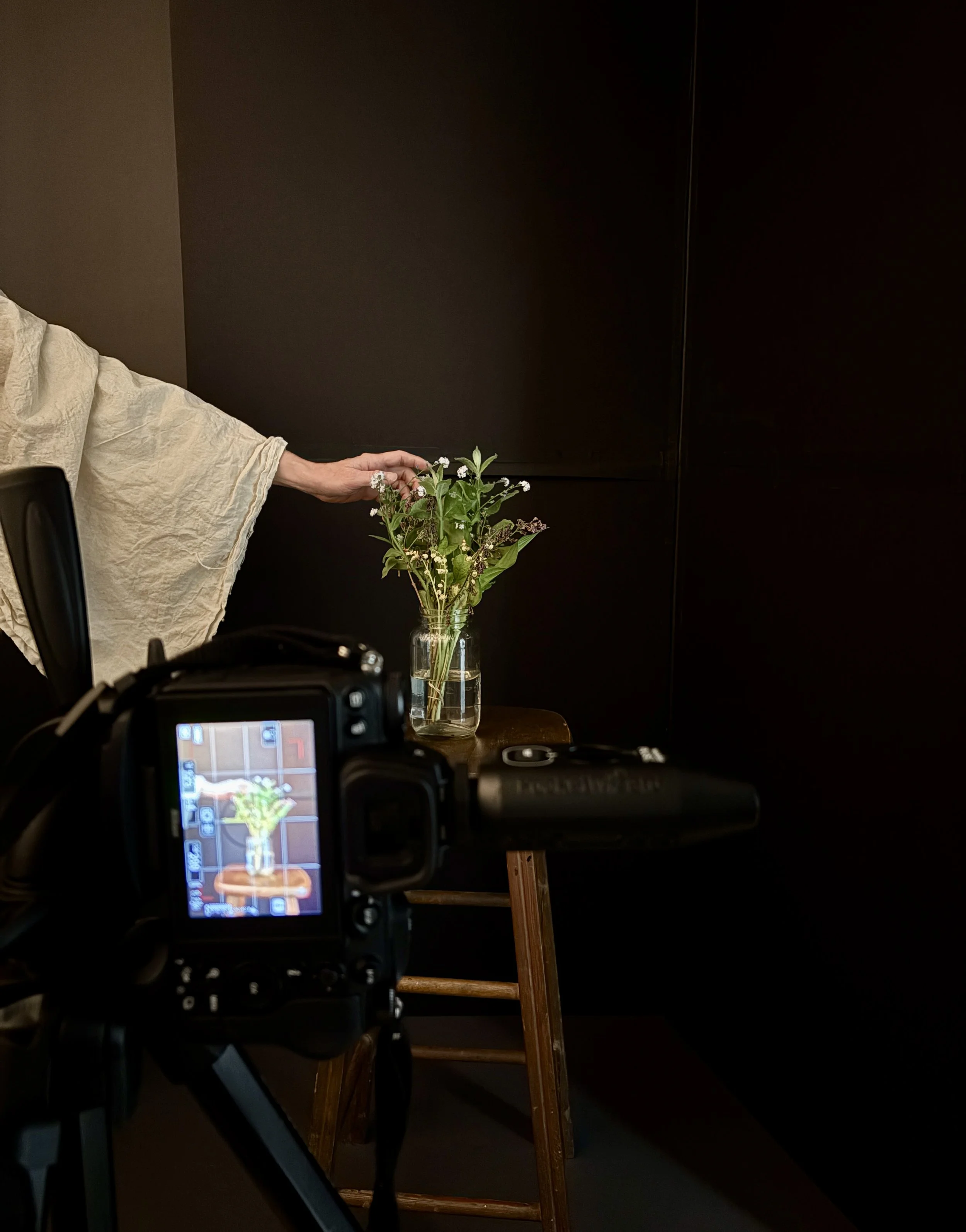 Artist Nikki Gardner in studio creating intuitive conceptual art