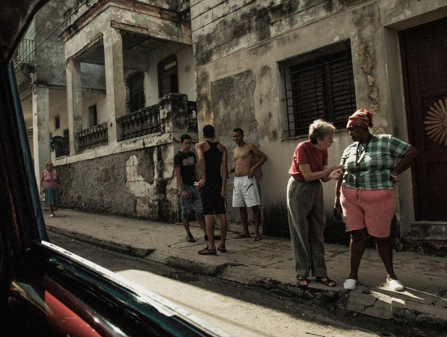 Conversations. The outskirts of Havana, shot from the back of a 1950s Buick — February 2012