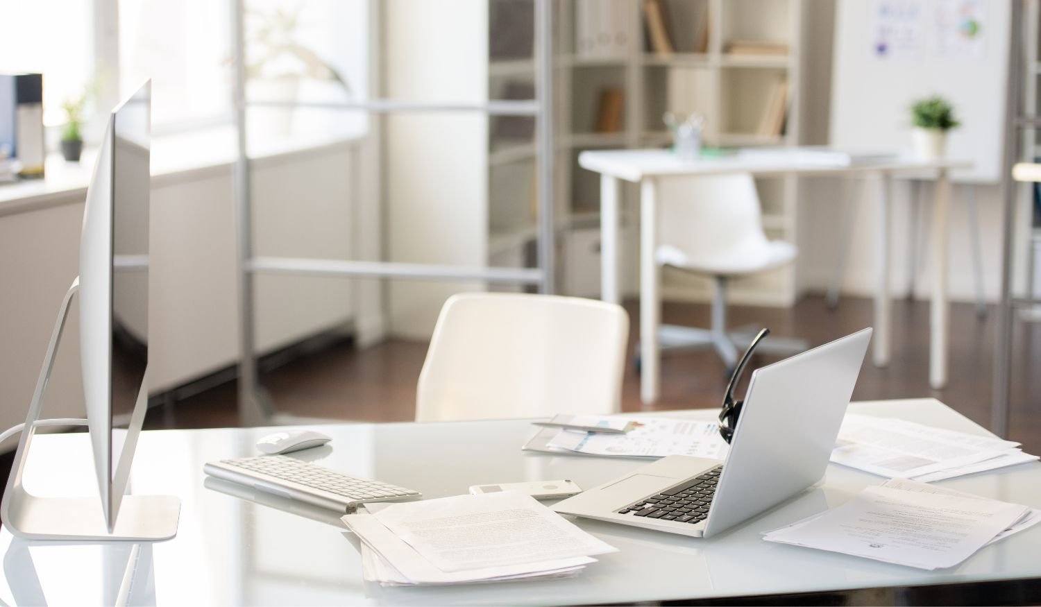 An empty workspace representing the hidden operational risk of overloading top performers in lean organizations