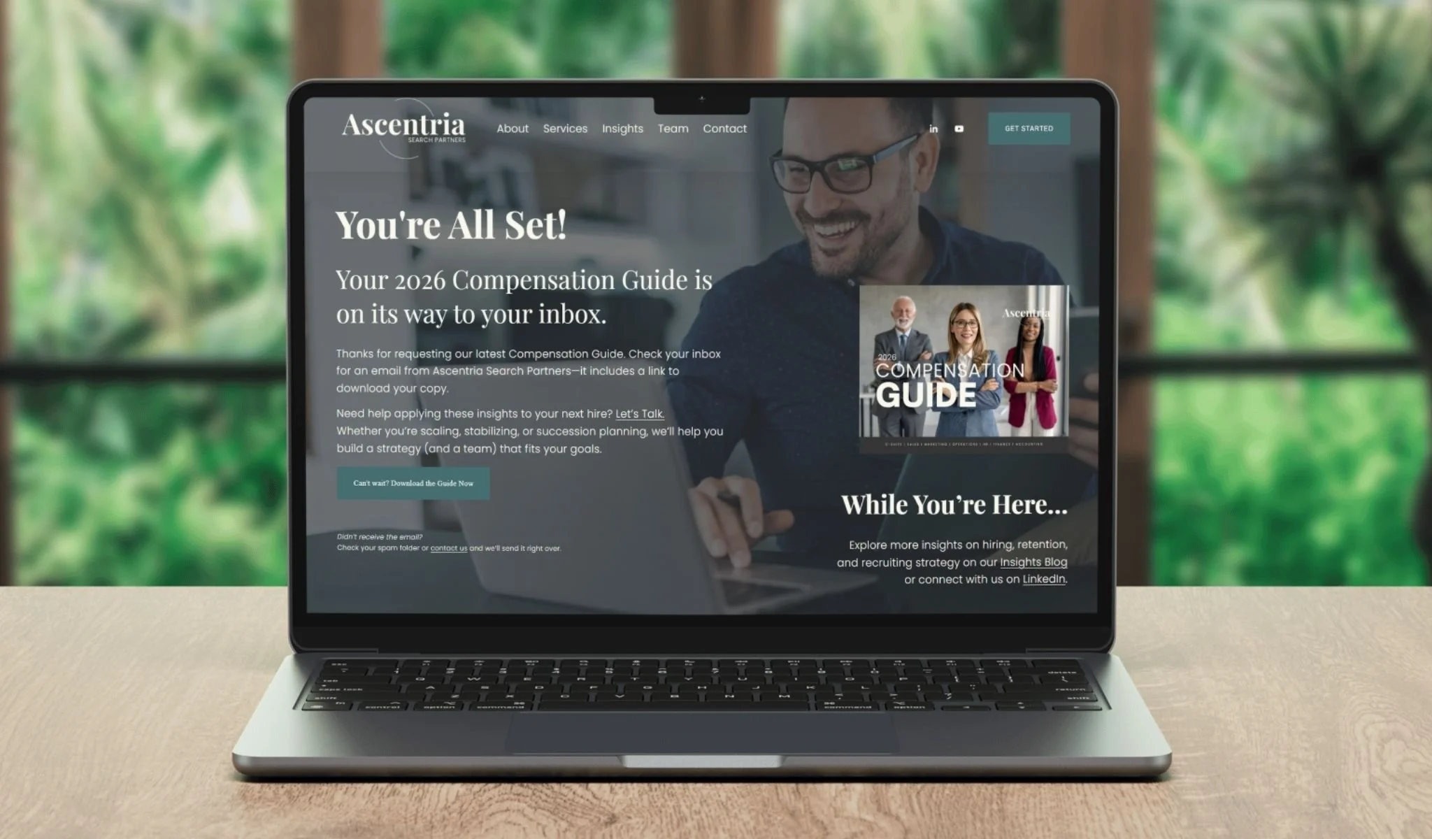 Laptop displaying Ascentria Search Partners’ 2026 Compensation and Hiring Guide confirmation page