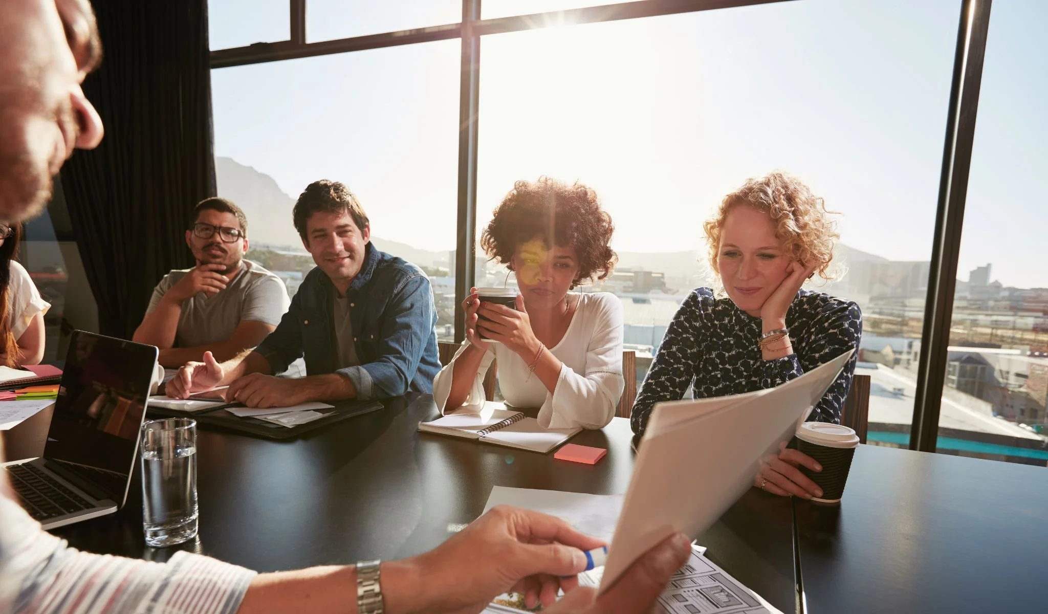 Leadership team reviewing strategy to identify execution gaps and talent alignment issues