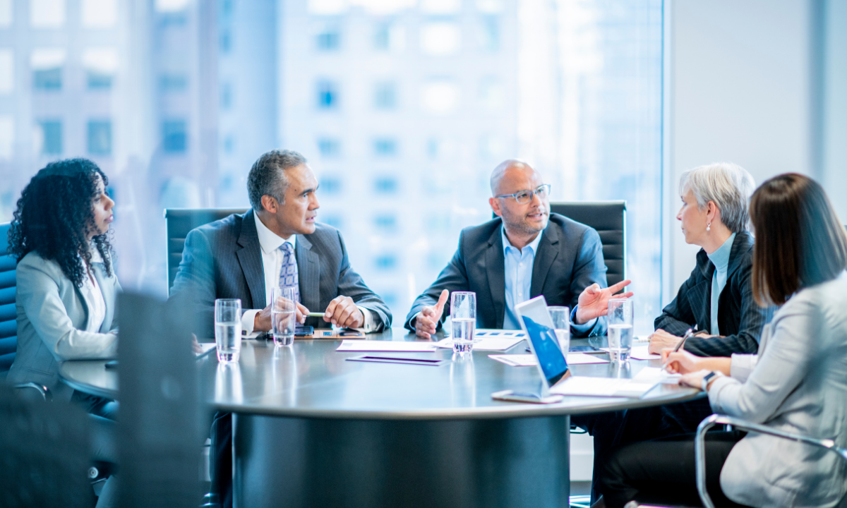 Senior leadership team discussing whether the organization has the capacity to execute its next growth move.
