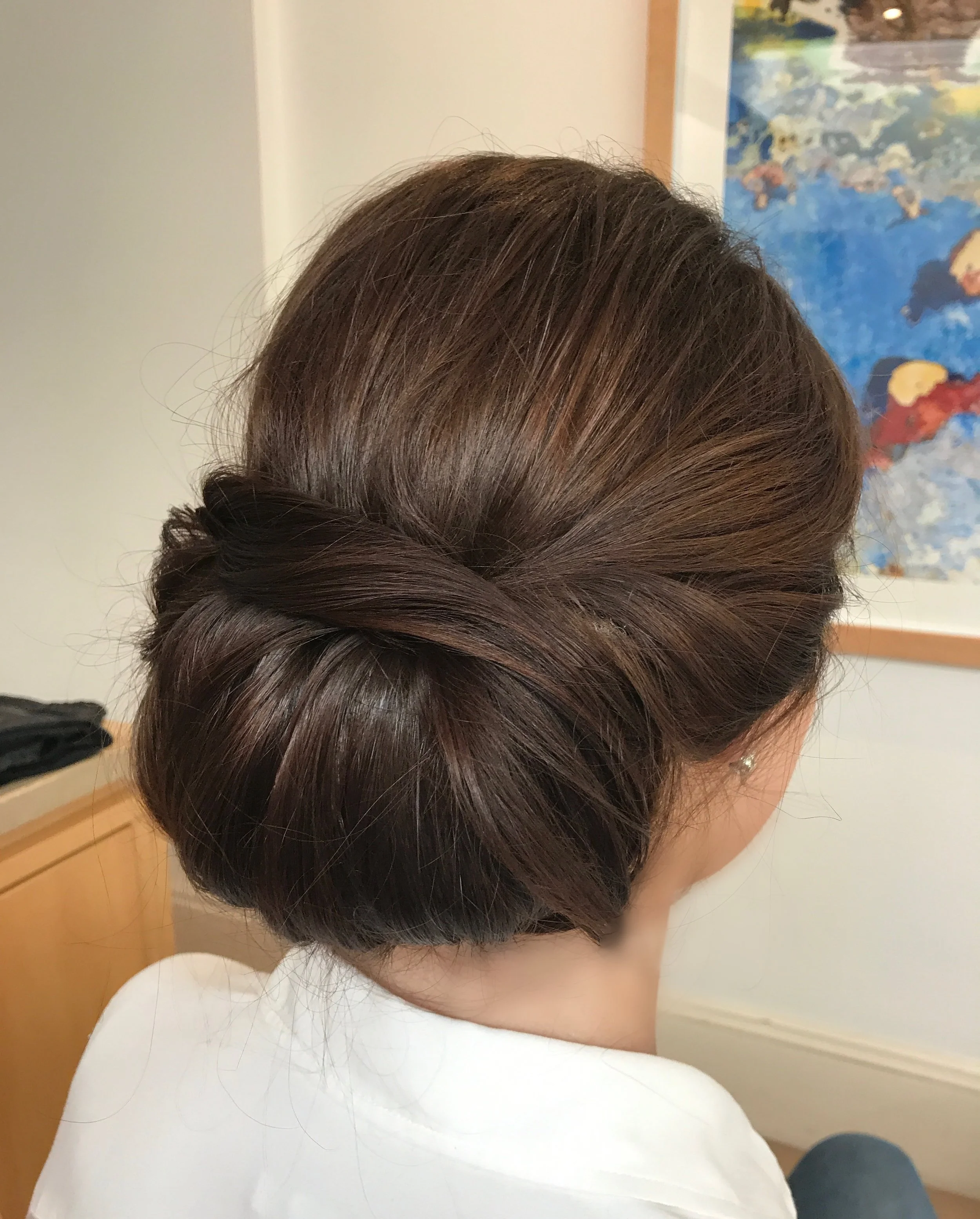 Elegant soft bun up style created by Sydney hairstylist Nikki Mahera