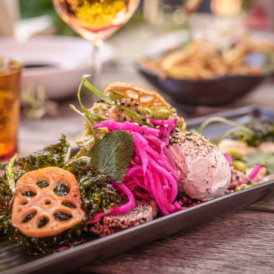 Layered. Crunchy. Creamy. Tangy. Fresh.

Every bite brings another pop, crispy kale + lotus, walnut tofu crema, bright pickled veg, herbs, edamame &amp; furikake on OMGoodness, sunflower &amp; sesame gluten-free bread

The crunch, the colour, the cre