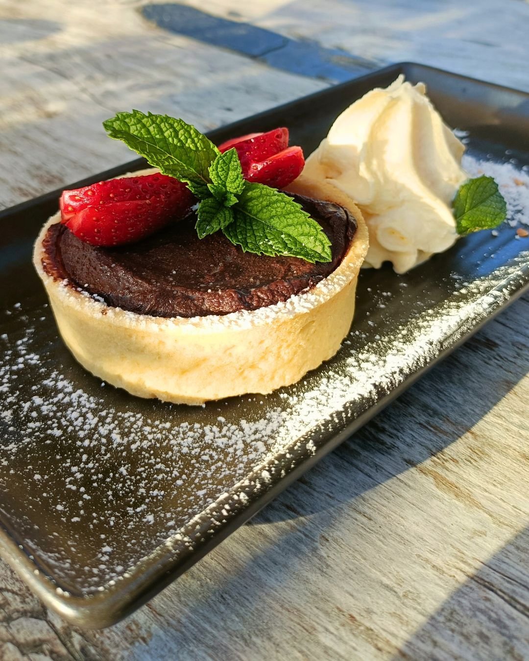 Dessert for the evening 🍫🍓

Whittaker&rsquo;s chocolate ganache tart, served with fresh strawberries and soft Chantilly cream.
Rich, smooth, and exactly the kind of dessert that deserves to be lingered over.

We&rsquo;re also open tonight with our 