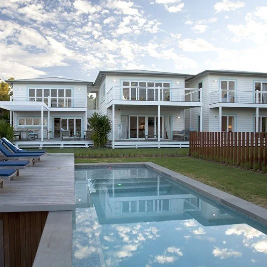 Relaxed Coastal Living in the Heart of Nature

This two-storey timber-framed beach house captures the essence of laid-back coastal living. 

Nestled in Eagle Bay&rsquo;s pristine bushland, the home blends natural materials, breezy architecture and th