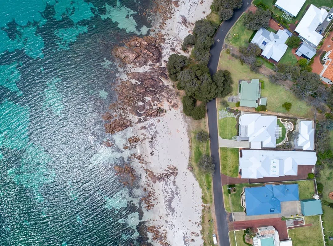 From up here you can really see how well these homes sit in the landscape, clean rooflines, practical materials, and built to suit the coast. Capturing the use of @colorbondsteel  in this shot for good reason: it handles our conditions, looks sharp, 