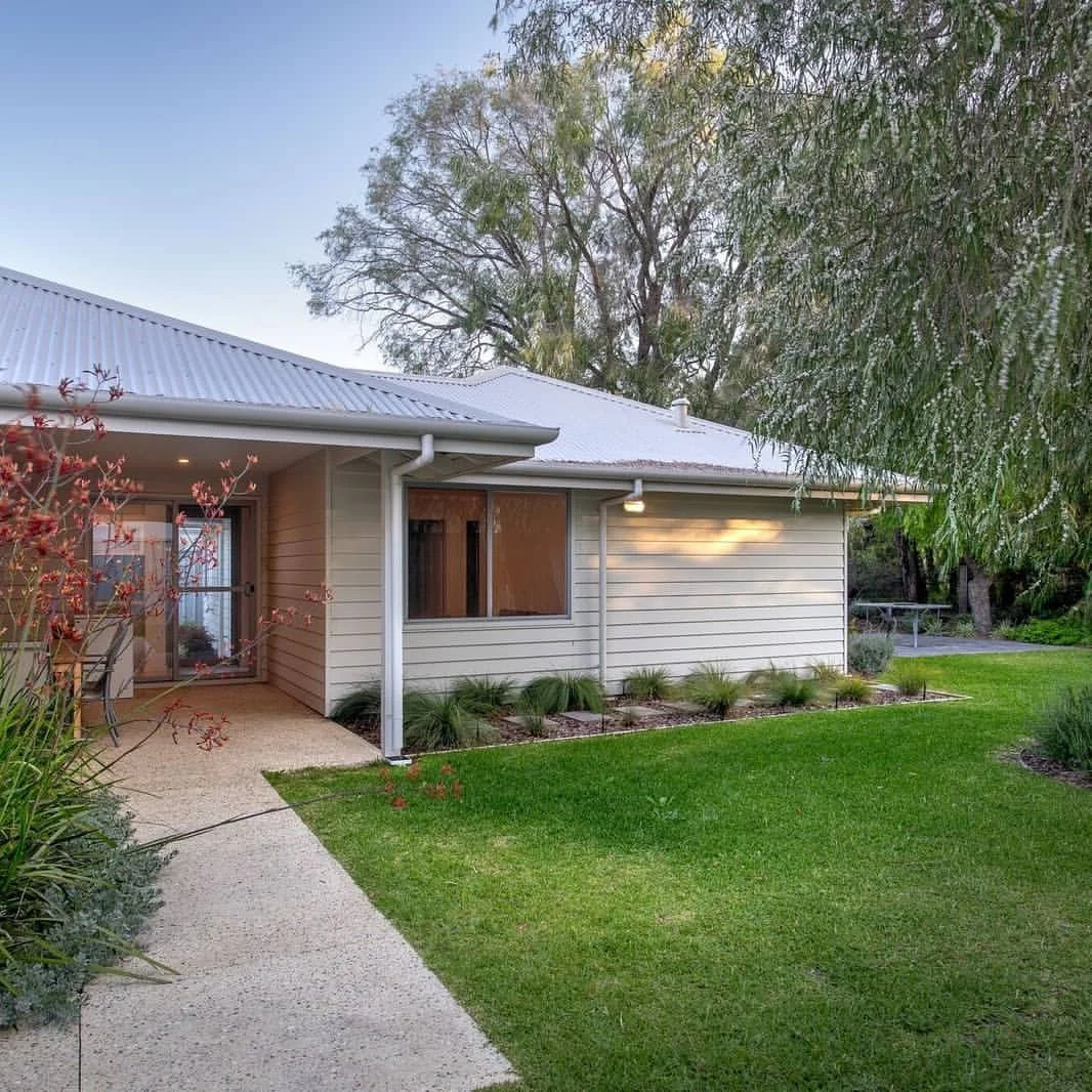 Go to the last slide for the before and after.

This home was built by the original owners, then later renovated and extended to suit their growing family. Same address, completely different feel.

Inside, the dated interiors were stripped back and r