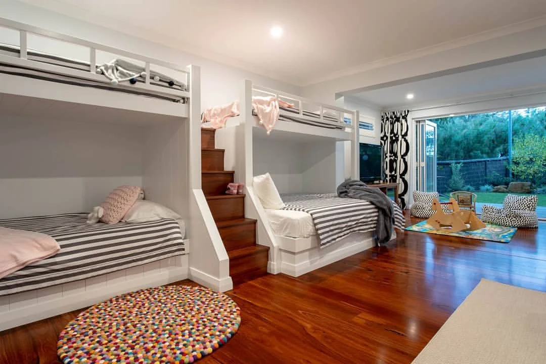 Designed for everyday coastal living in Dunsborough.

This timber-framed, two-storey home was built with family life in mind, light, space, and a layout that makes sense day to day. The bifold doors at the rear open straight onto the deck and lawn, s