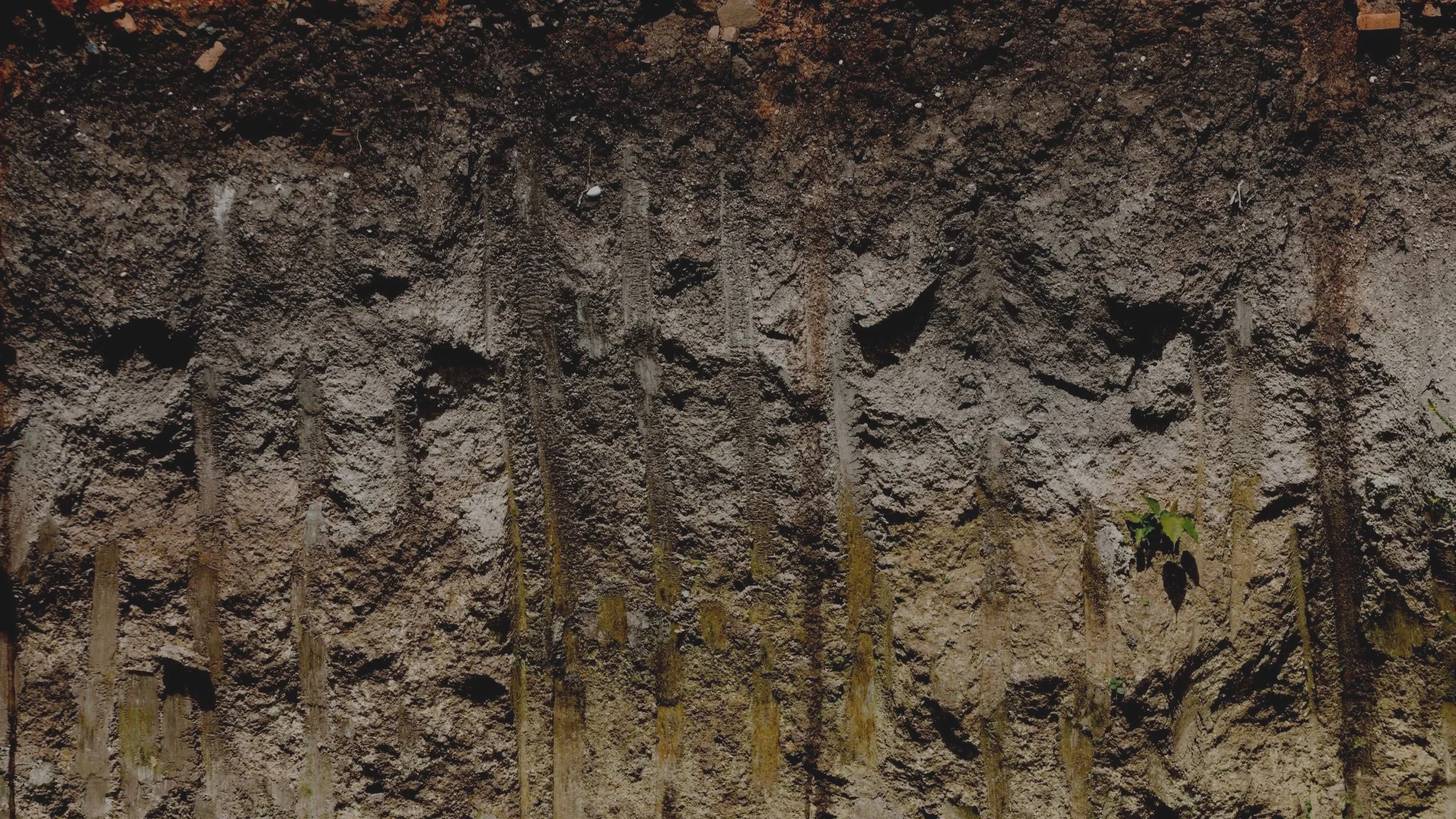 The exposed side wall of an excavation clearly identifies the layers of soils indicating the natural material is suitable for classification as VENM or ENM