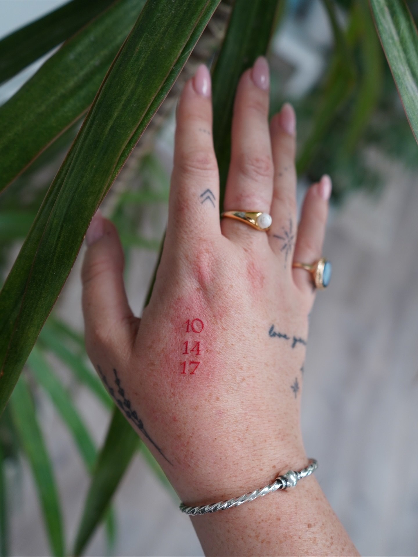 Their own way of matching &mdash; their wedding date for her, her initial for him. ✨ Done by @kimdracula.ink 💕

#MorningGloryTattoo #CoupleTattoos #MatchingWithoutMatching #FineLineTattoo #MinimalDesign #CTTattooStudio #TattooInspo #cttattoo #fineli