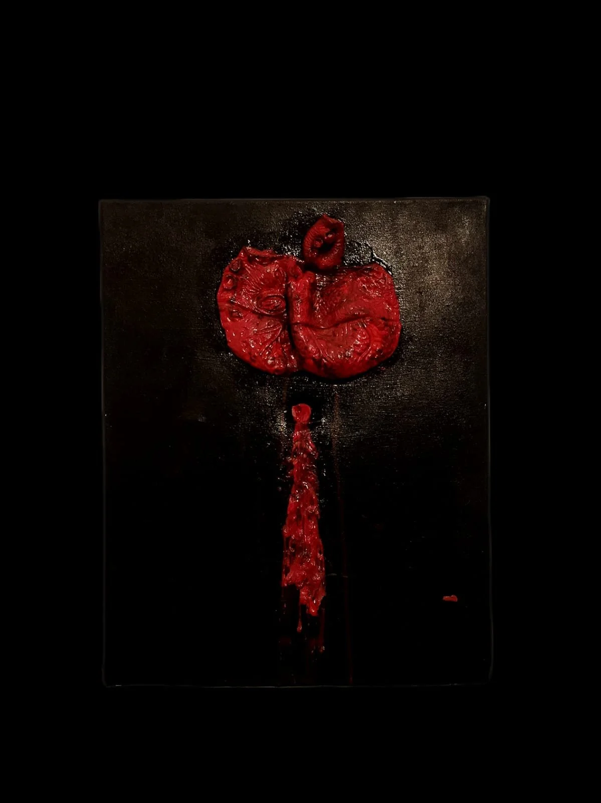 Abstract art with red textured shapes on black background