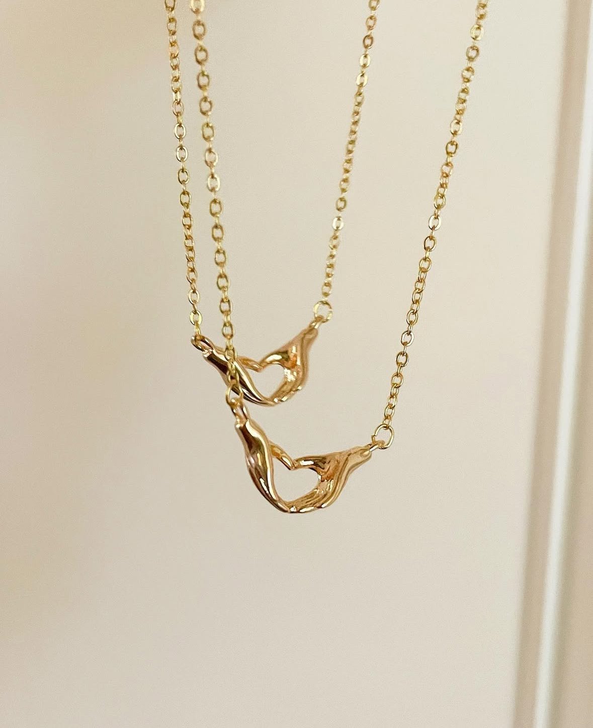 Hand heart necklace.jpg