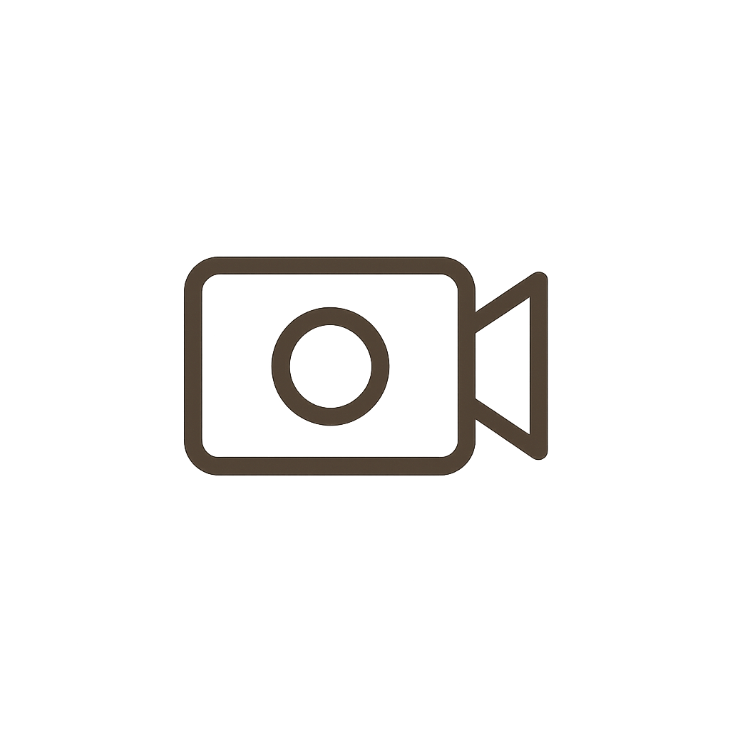 Icon of a video camera in brown color indicating video recording or filming.