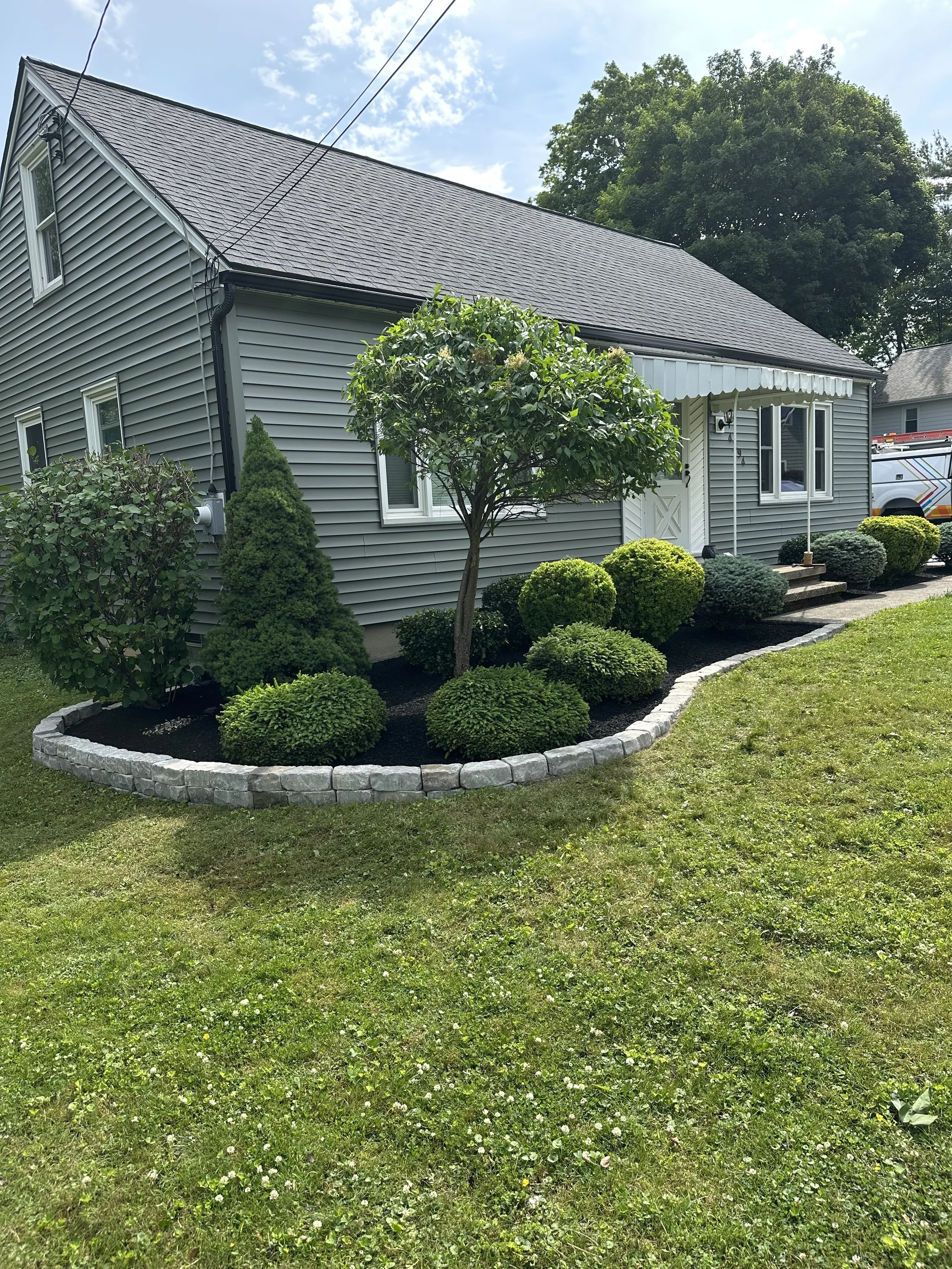 Small 3 tier retaining wall installed