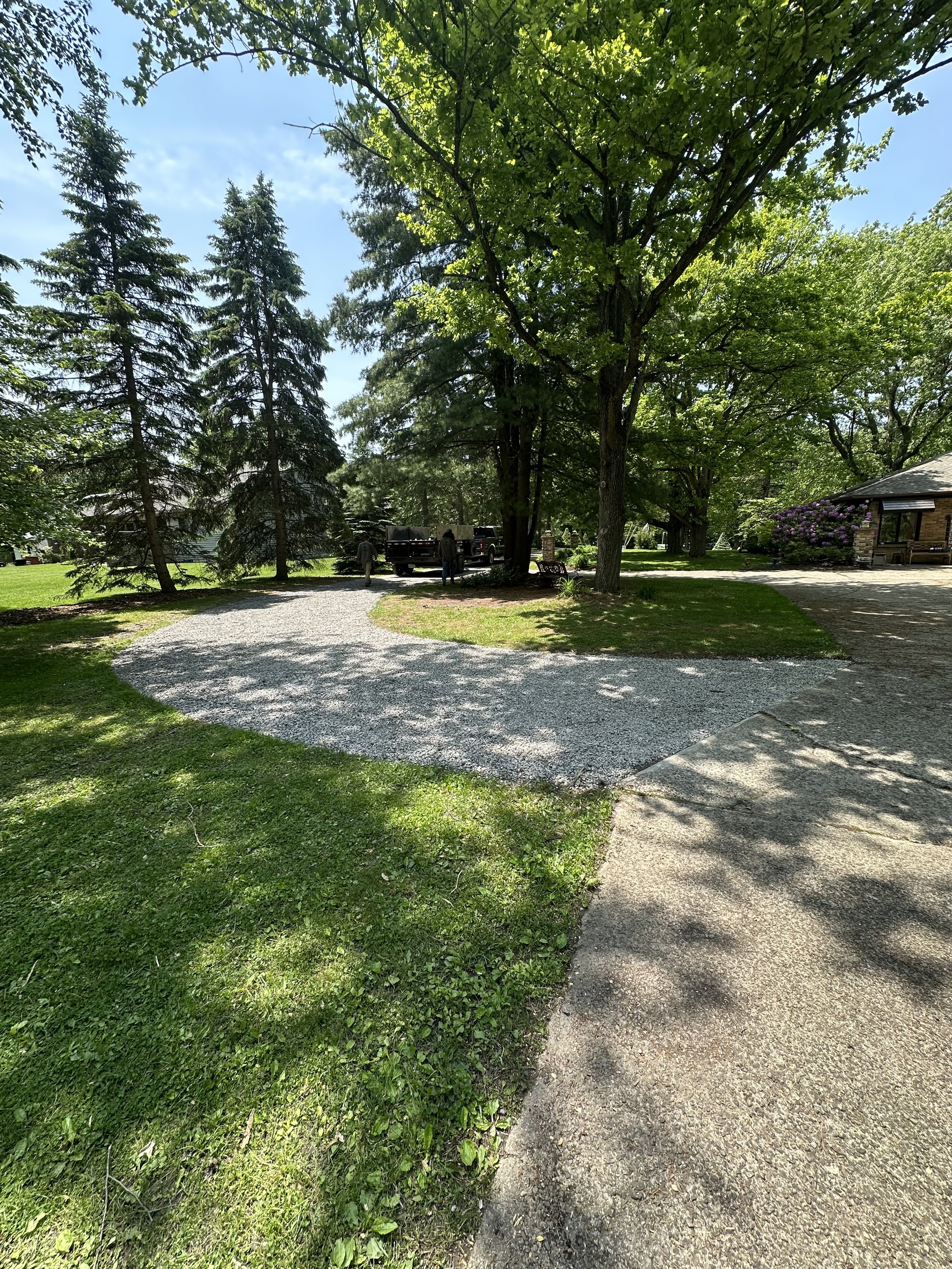 Resurfaced driveway with stone