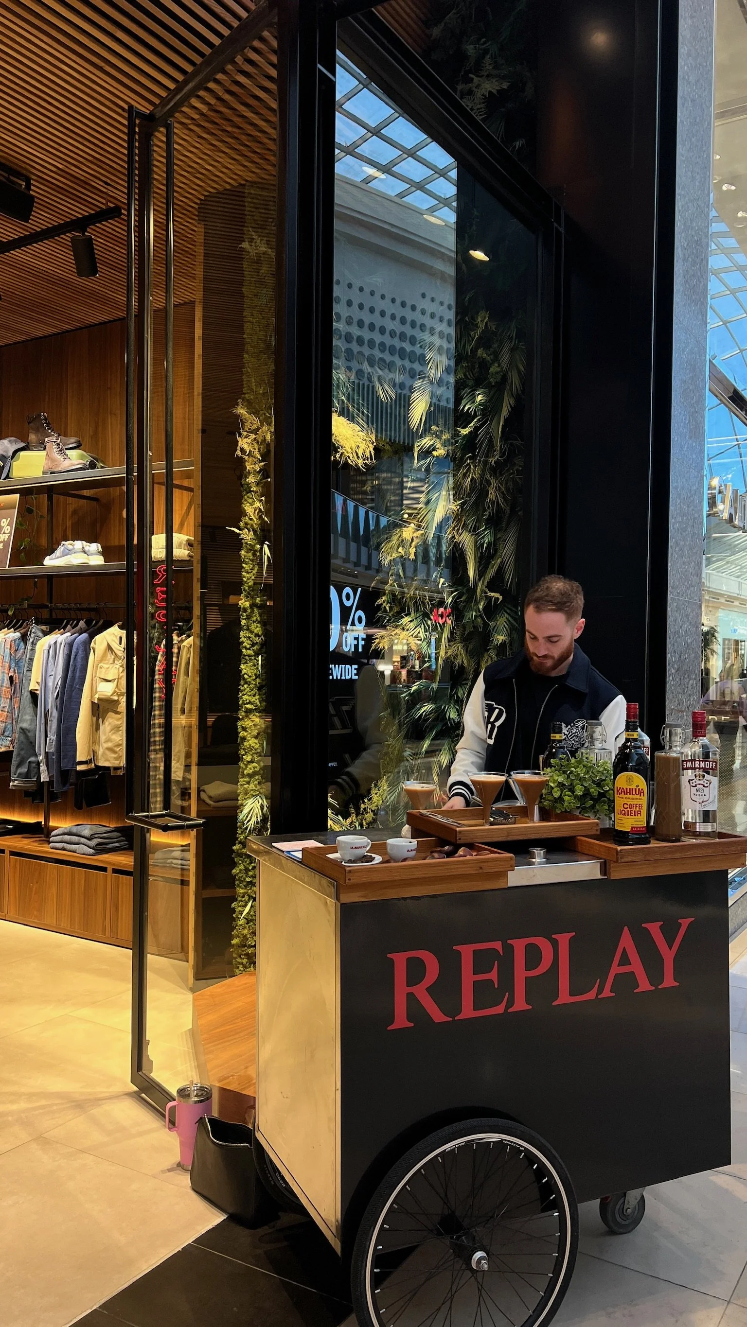 Replay branded drinks cart at a corporate retail event