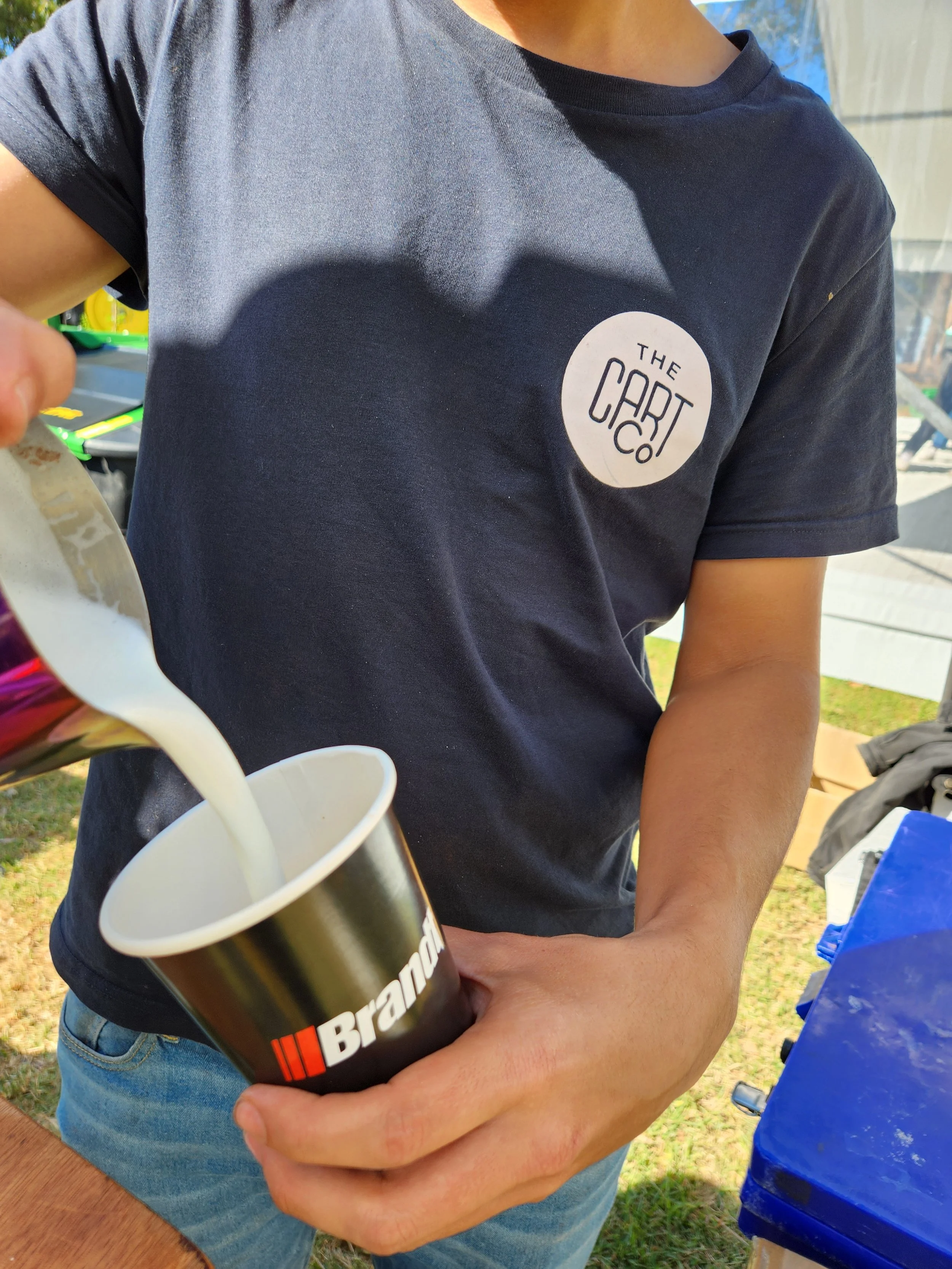 barista-pouring-milk-coffee-cup.jpg