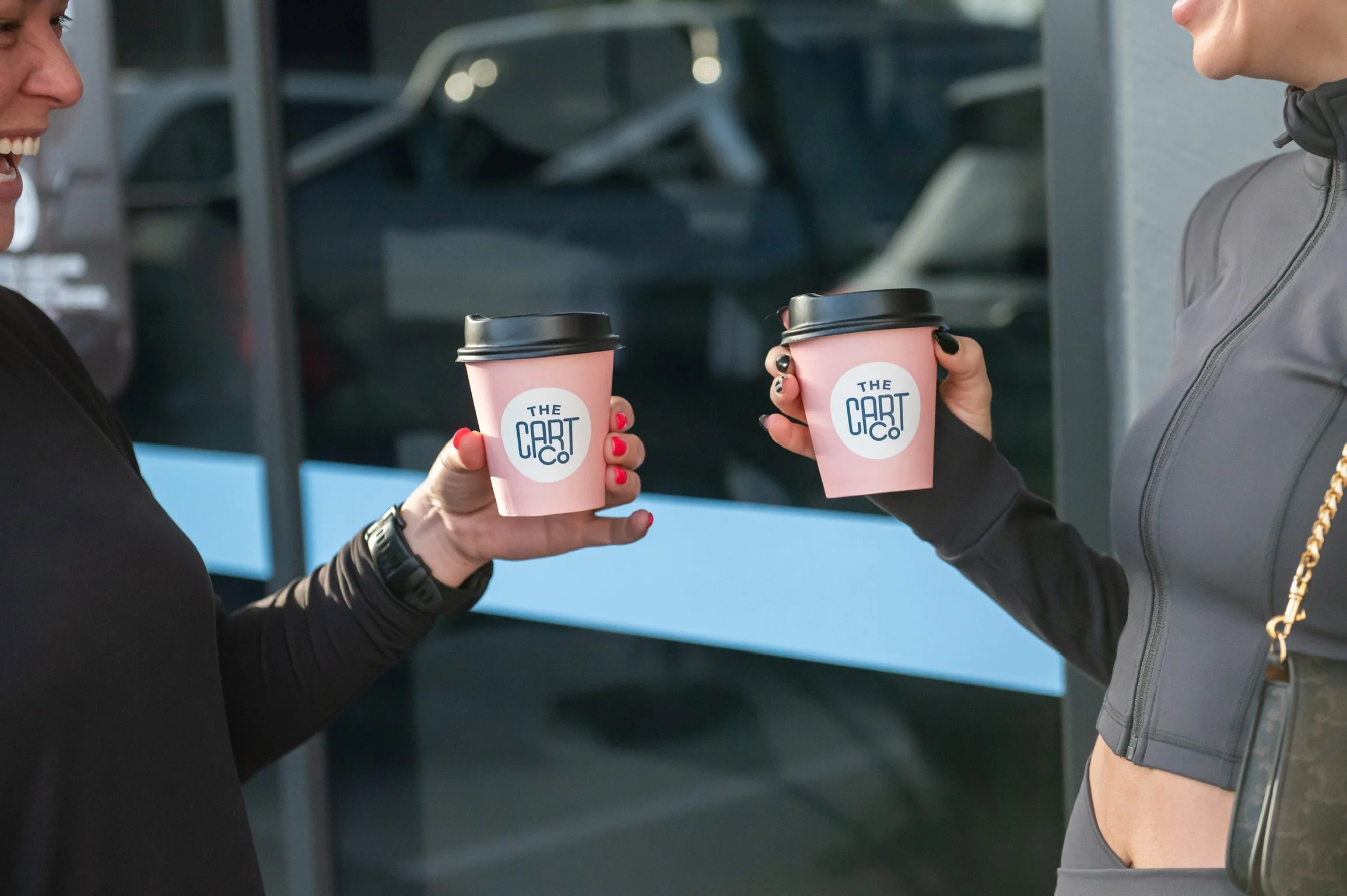 guests-toasting-pink-coffee-cups.jpeg