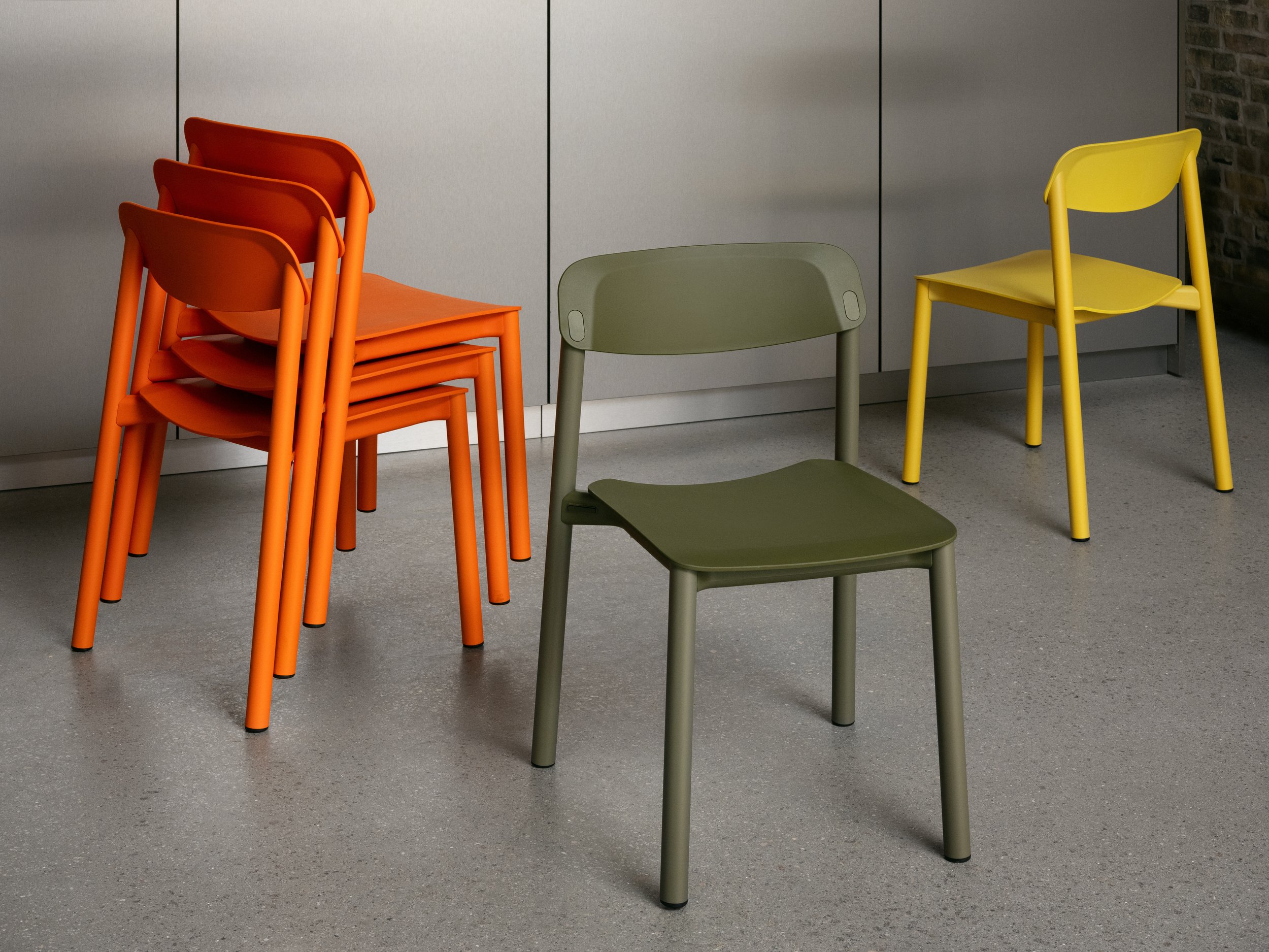 Lammhults_Penne_chairs_orange_stack_green_yellow_e01.jpeg