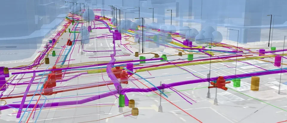 A digital 3D model of a data center  with underground utility lines and infrastructure, including colored pipes and conduits.