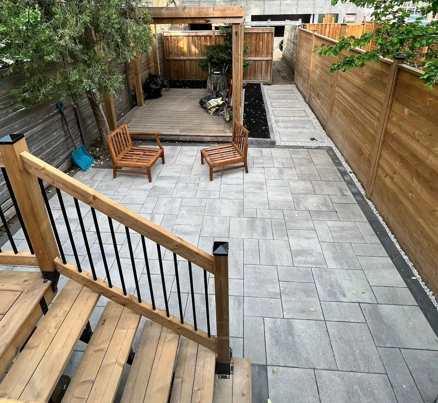 small backyard interlocking patio cost Toronto furniture layout