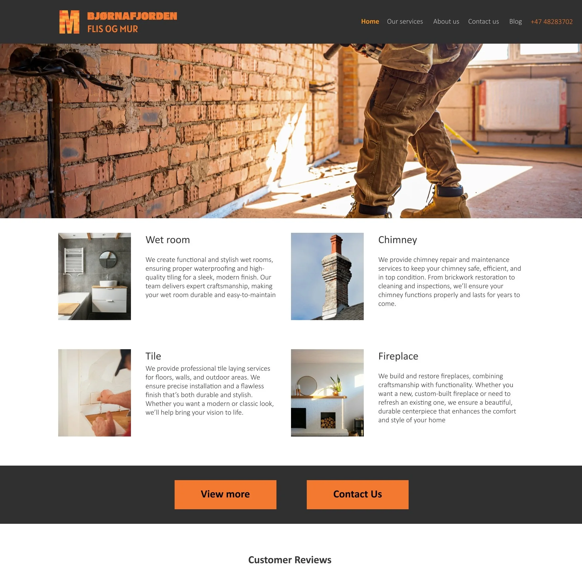 A construction worker installing drywall on a red brick wall inside a building under construction with sunlight illuminating the scene.