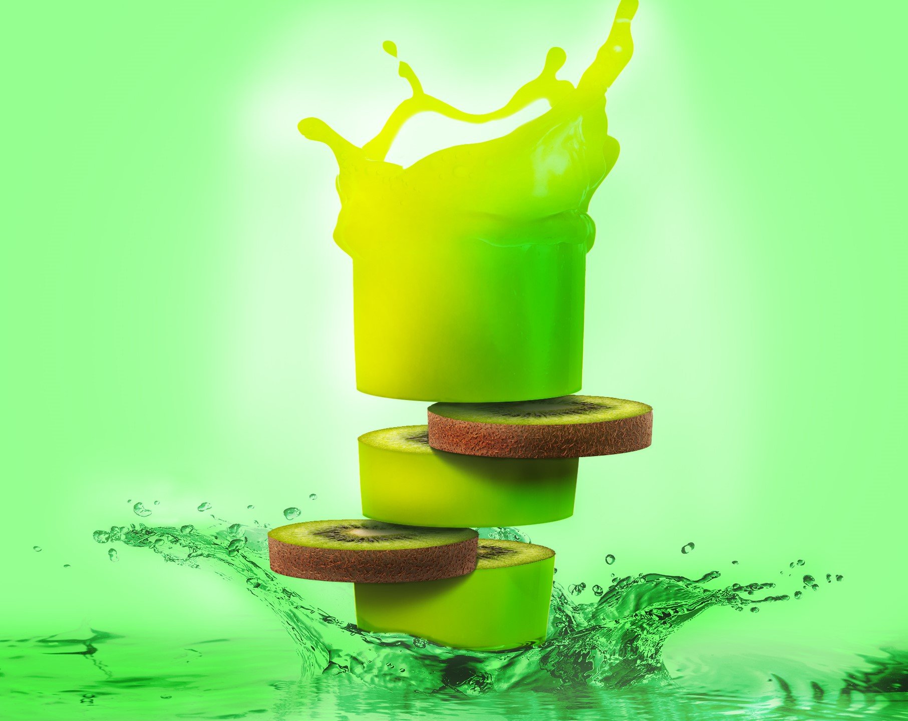 Fallen slices of kiwi and lime with a green splash in the background and water splash at the bottom.