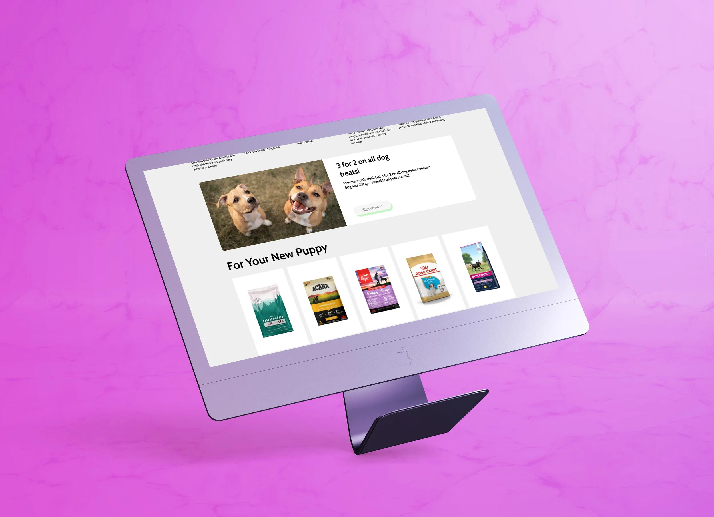A computer monitor displaying a website about dog treats, with images of various pet food products and a promotion for dog treats.