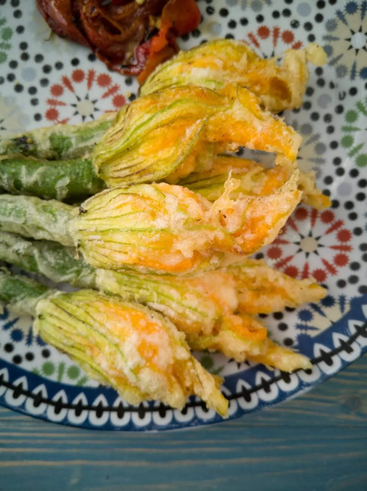 Stuffed tempura courgette flowers