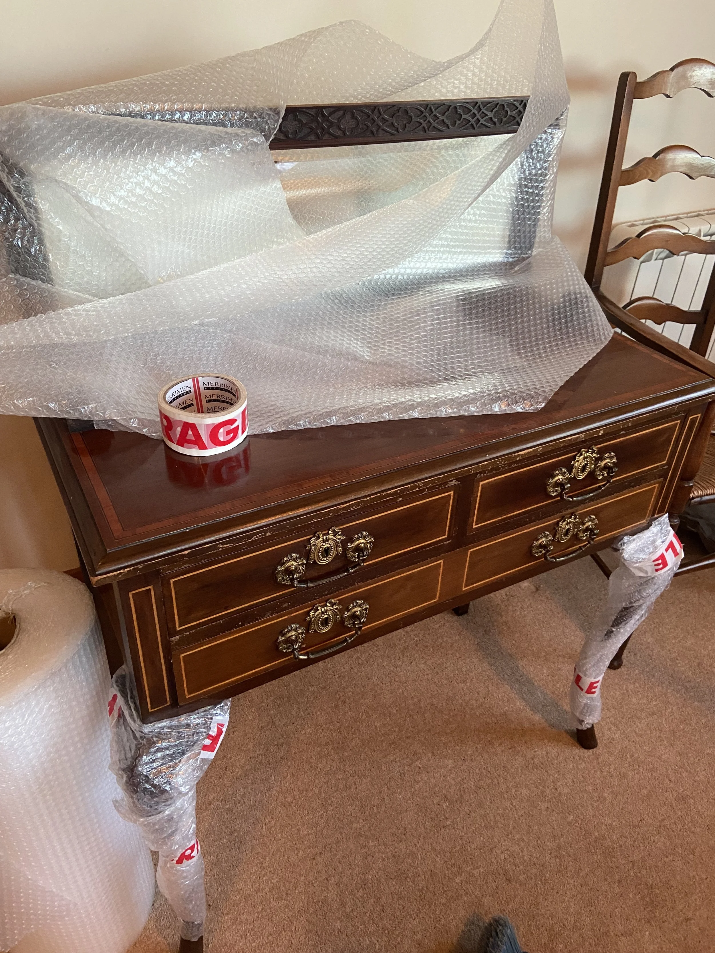 Carefully packed furniture ready for moving home