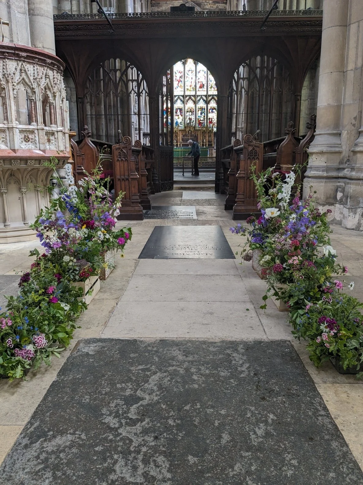 A garden of flowers inside the church. 