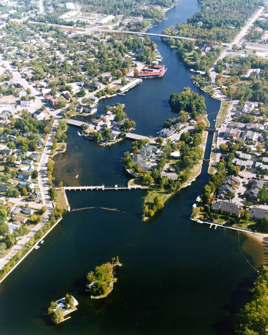 Aerial view of Bobcaygeon showing the locks, islands, and winding waterways that define this scenic waterfront community.