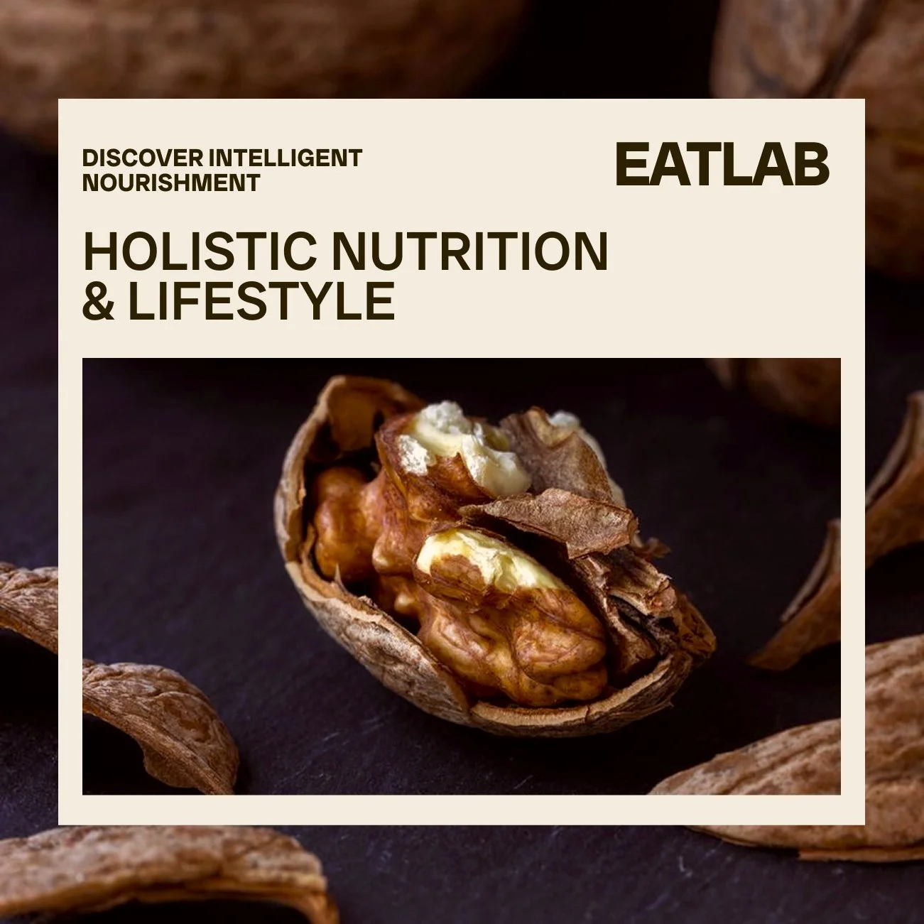 A promotional image featuring a walnut and walnut shell with a background of more walnuts, advertising holistic nutrition and lifestyle, associated with EATLAB and Discover Intelligent Nourishment.