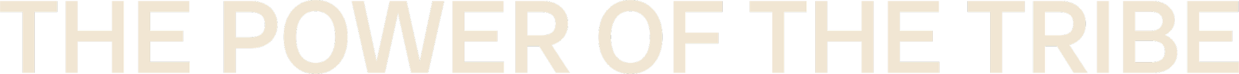 Close-up of bold text reading 'The Power of the Tribe' on a beige background.