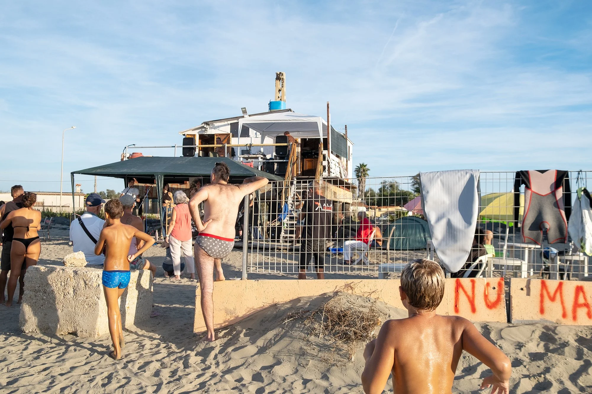 People attending a music event at one of the Bilancioni, 2025