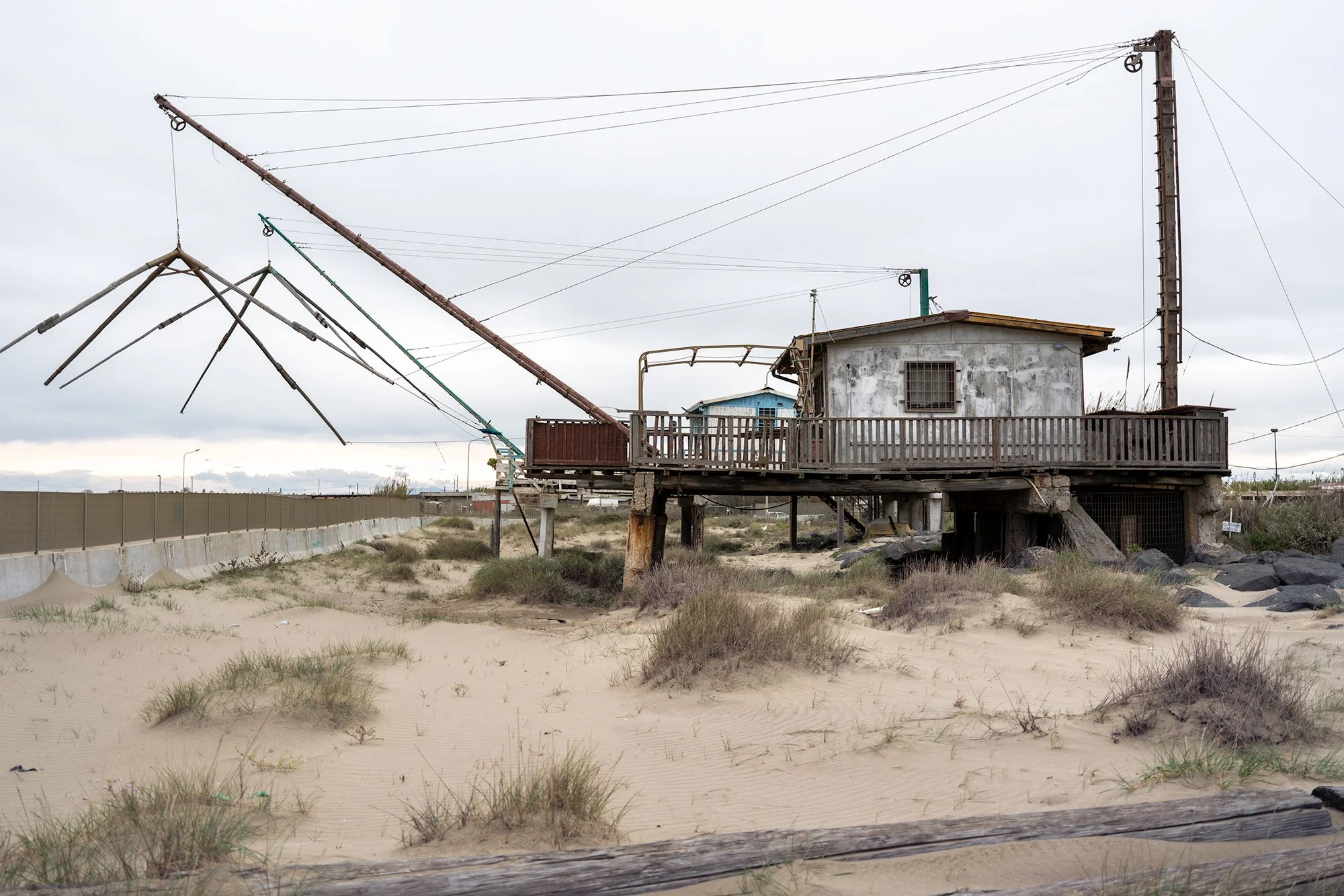 Traditional fishing structure (Bilancione) within the construction site area, 2026