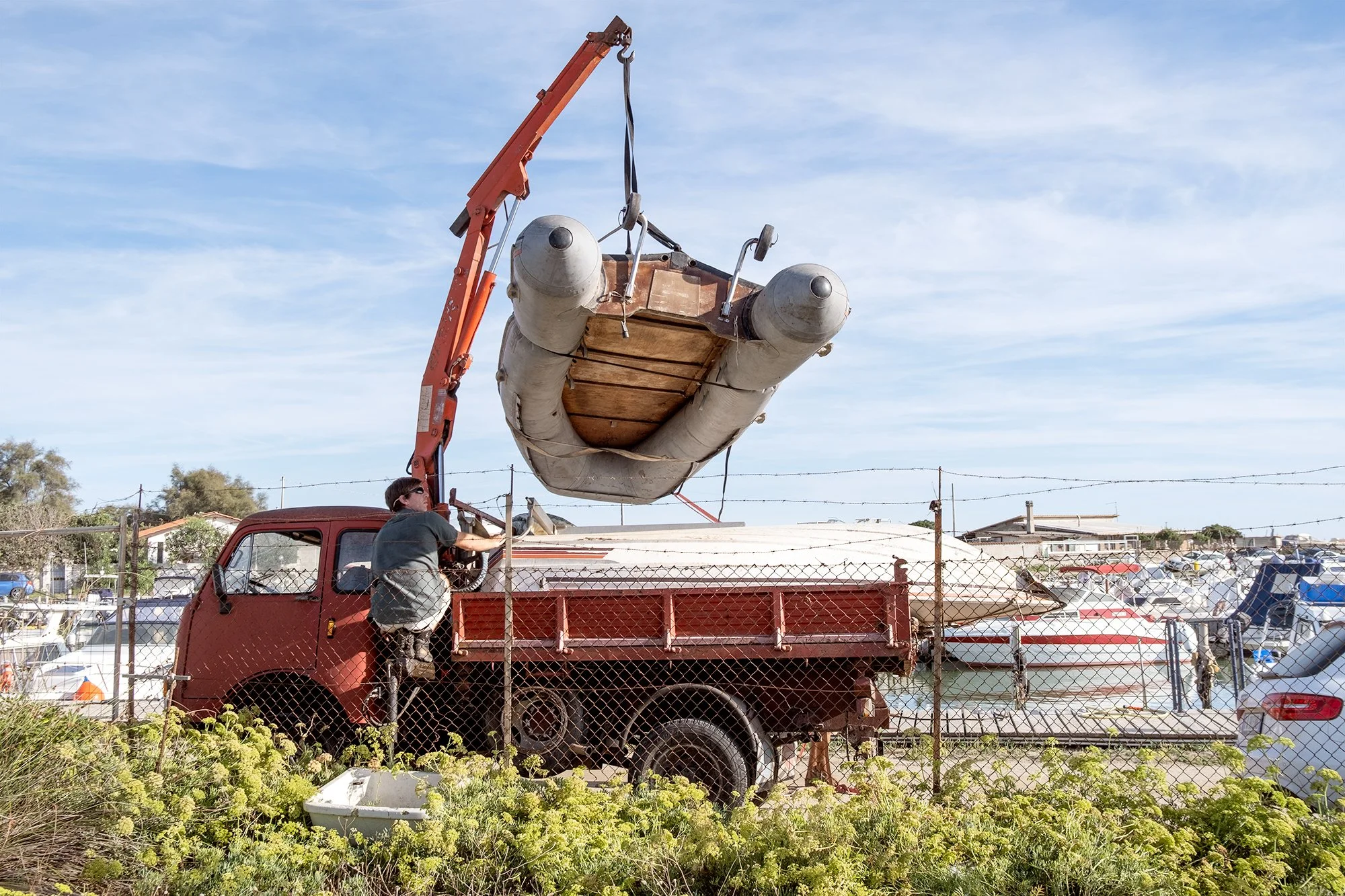 Nicola getting the dinghy read to head out, 2025