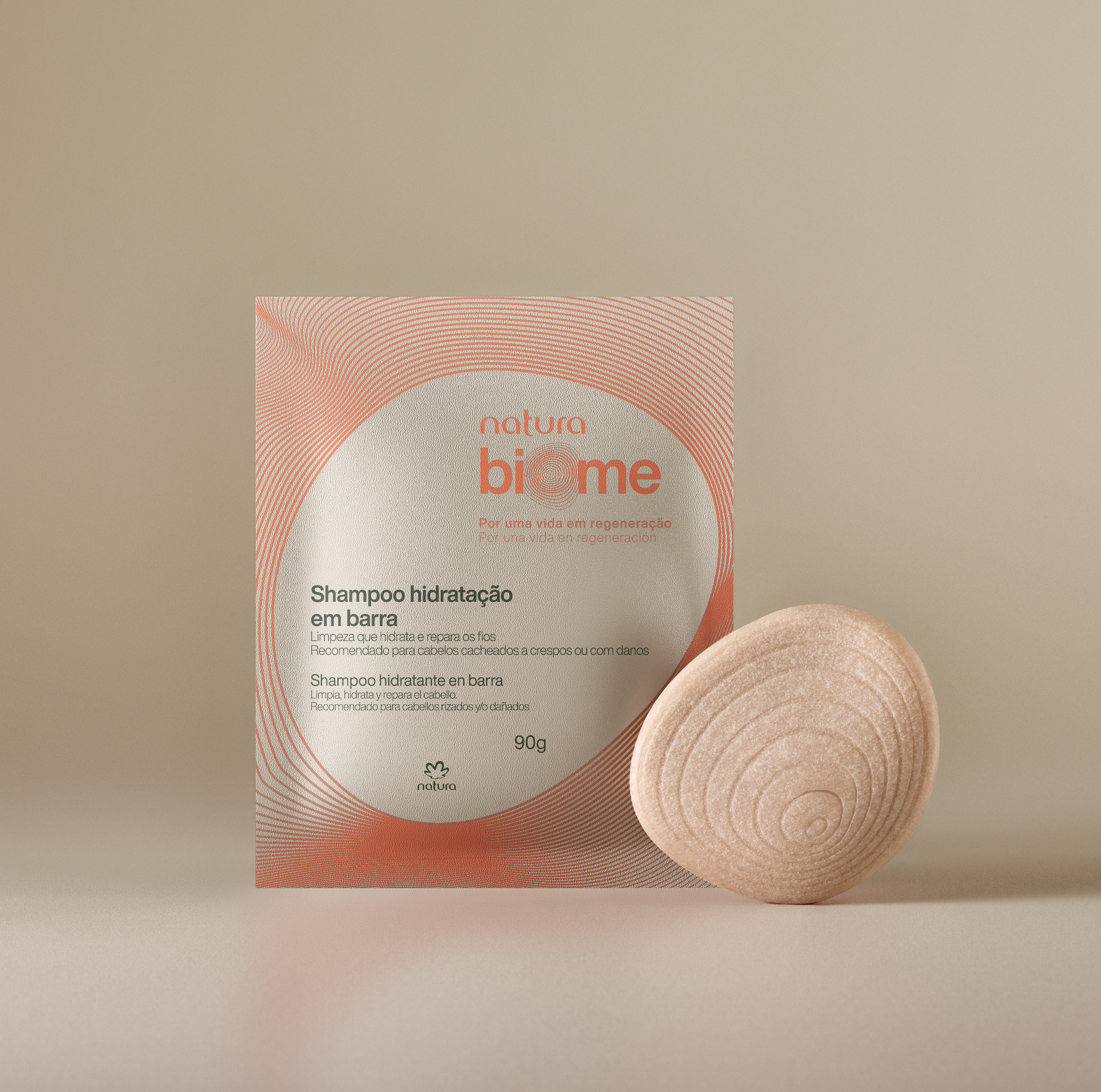 Image of a bottle of moisturizing shampoo from the Natura Biome brand, featuring a design in shades of orange and white.