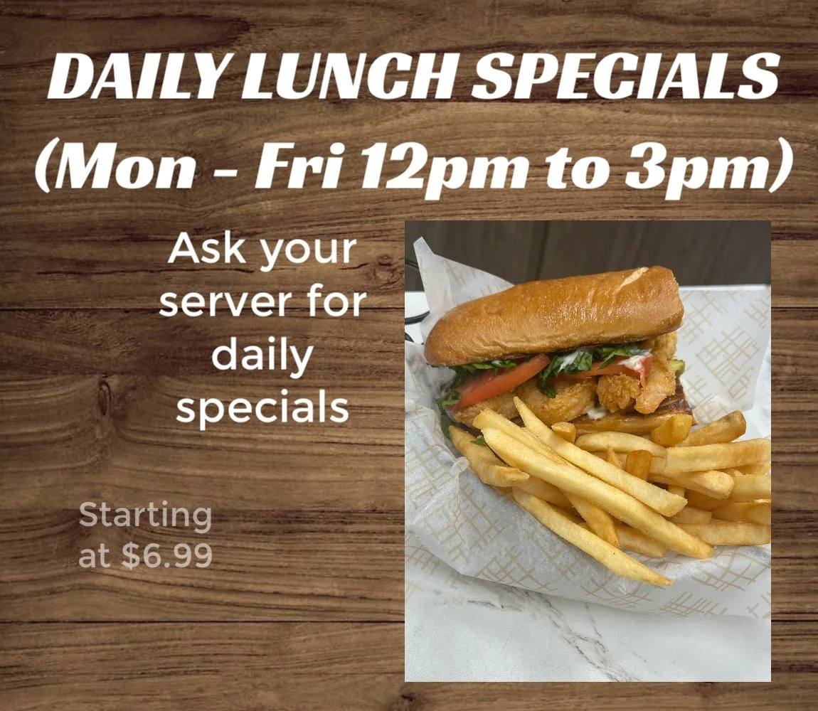 Sign advertising daily lunch specials from Monday to Friday 12 pm to 3 pm, featuring a picture of a fried fish sandwich with lettuce, tomato, and fries, priced starting at $6.99.